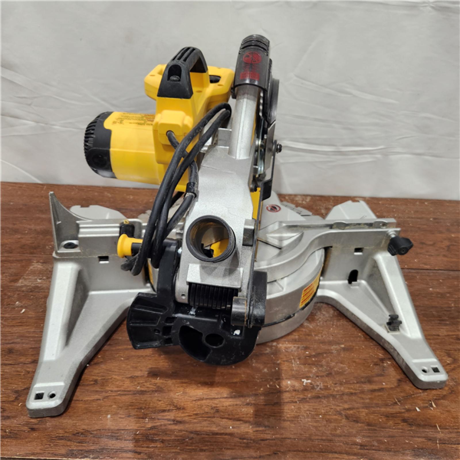 AS-IS  DEWALT 15 Amp Corded 10 in. Compound Single Bevel Miter Saw