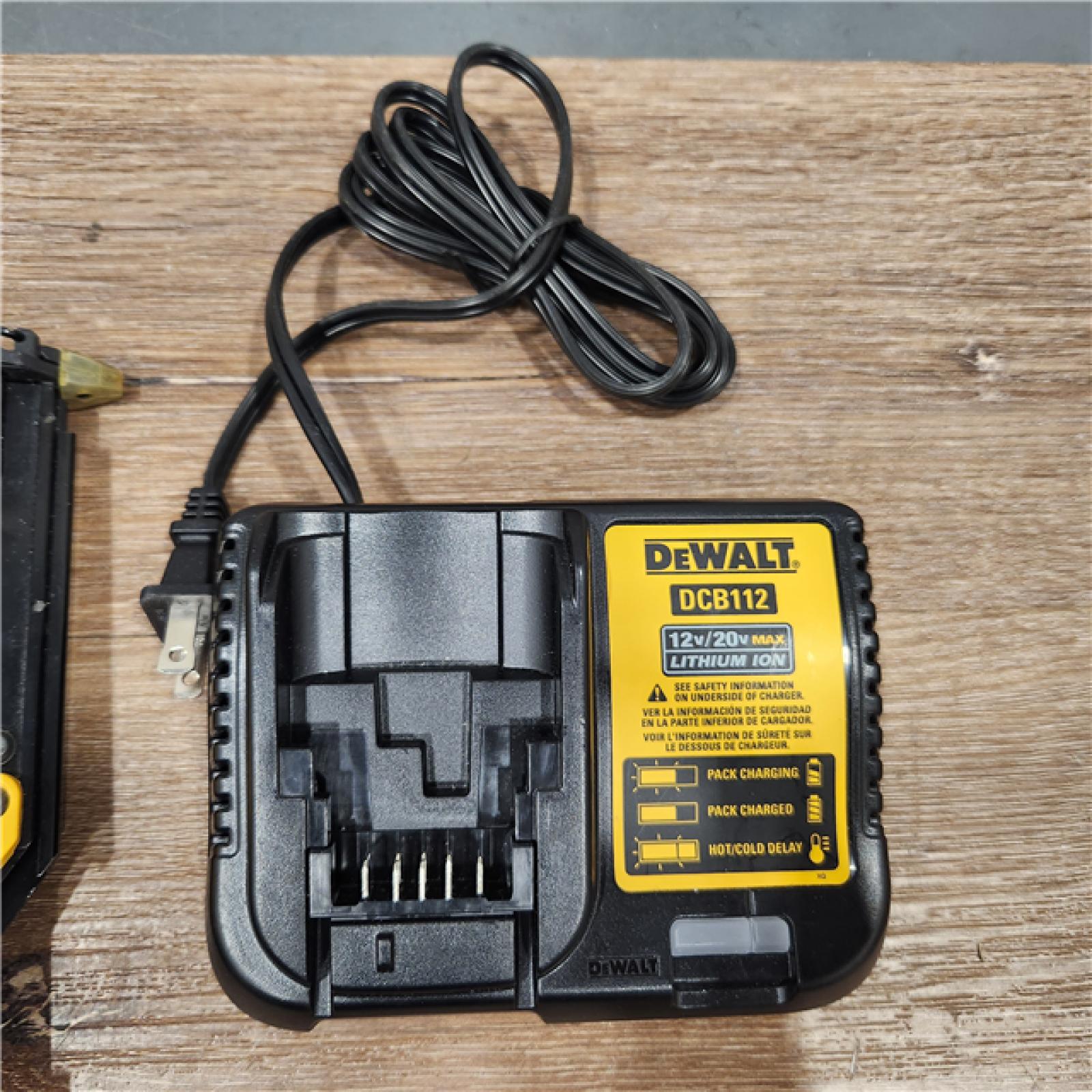 AS-IS DEWALT ATOMIC 20V MAX Lithium Ion Cordless 23 Gauge Pin Nailer Kit with 2.0Ah Battery and Charger