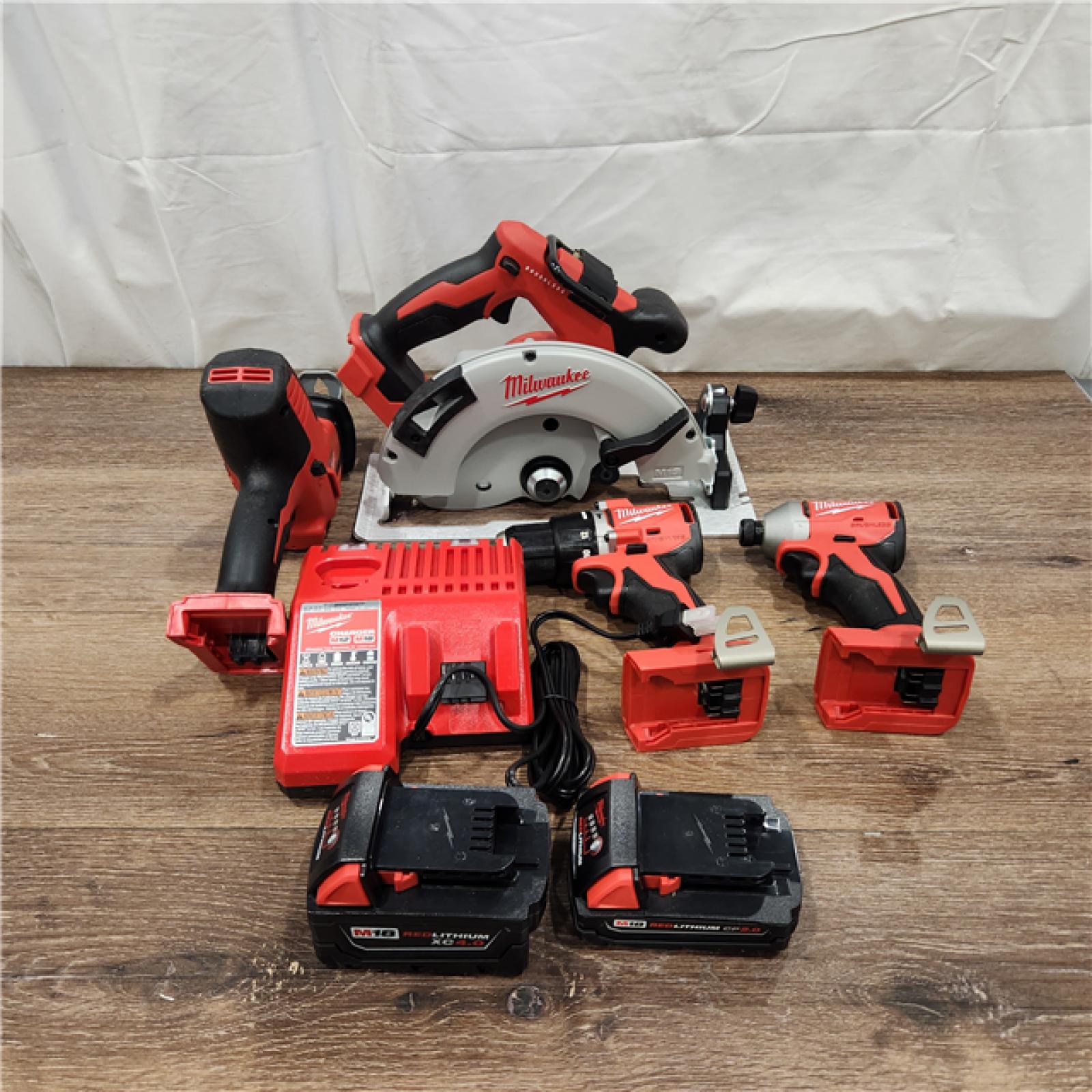 AS-IS M18 18-Volt Lithium-Ion Brushless Cordless Combo Kit (4-Tool) with 2-Batteries, 1-Charger and Tool Bag