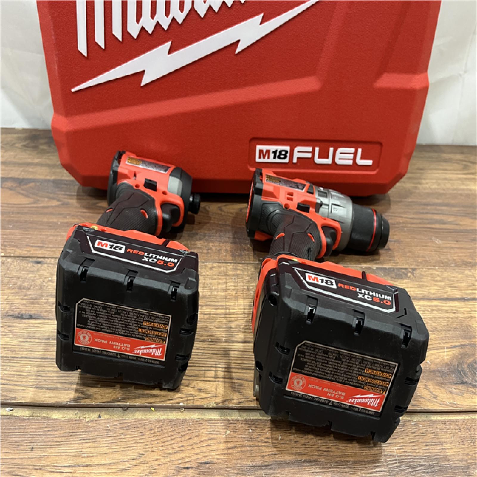 AS IS Milwaukee M18 FUEL 18V Lithium-Ion Brushless Cordless Hammer Drill and Impact Driver Combo Kit (2-Tool) with 2 Batteries