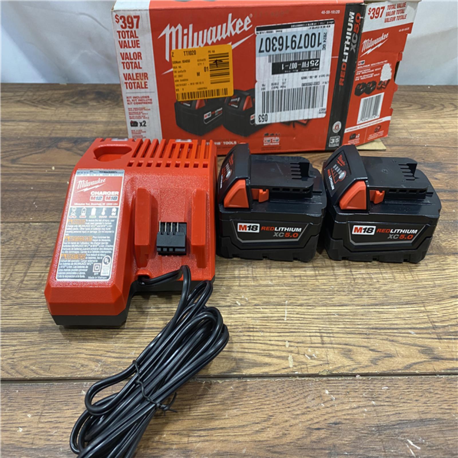 AS IS M18 18-Volt Lithium-Ion XC Starter Kit with Two 5.0Ah Batteries and Charger