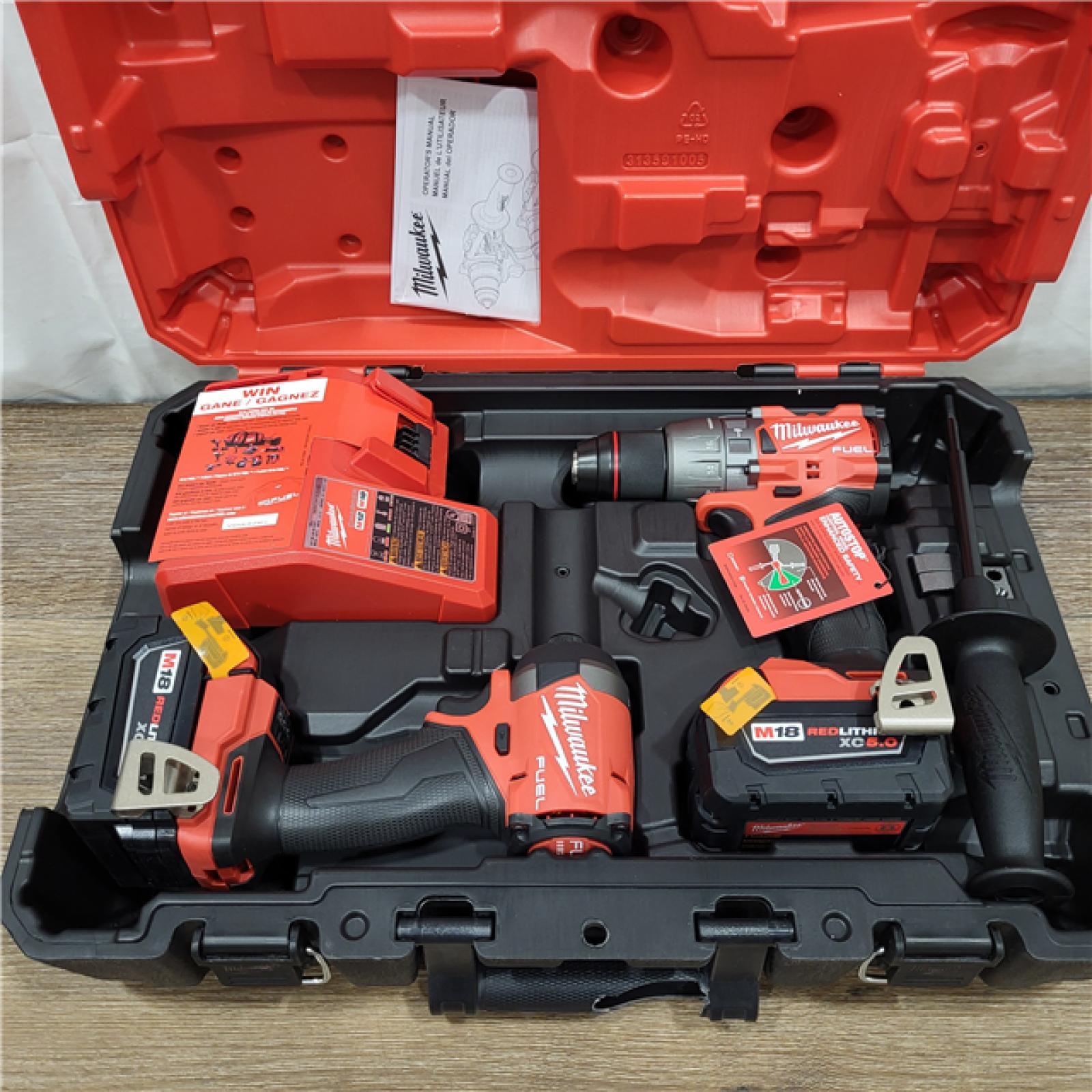 AS-IS M18 FUEL 18V Lithium-Ion Brushless Cordless Hammer Drill and Impact Driver Combo Kit (2-Tool) with 2 Batteries