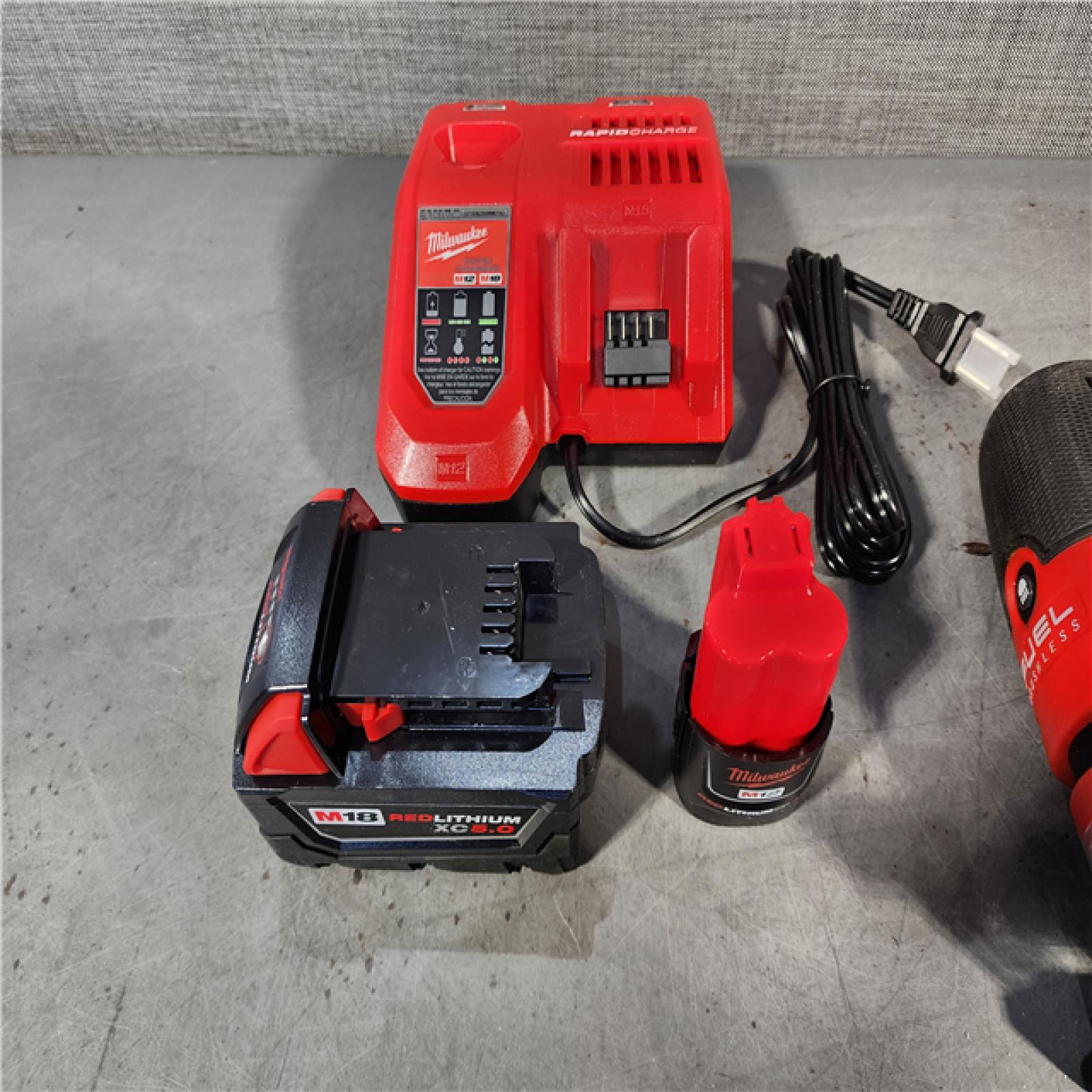 HOUSTON LOCATION - AS-IS MILWAUKEE 4 TOOL COMBO KIT W/ (2) BATTERY & CHARGER