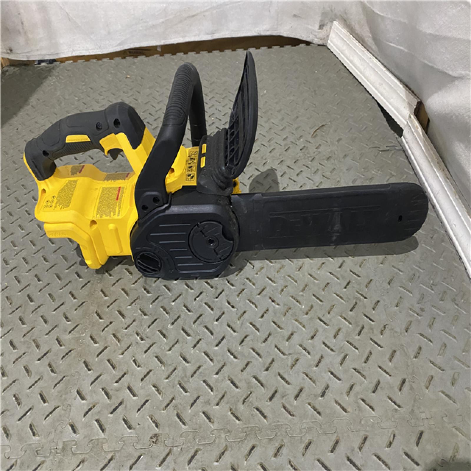 Houston location AS-IS Dewalt 7605686 12 in. 20V Battery Powered Chainsaw