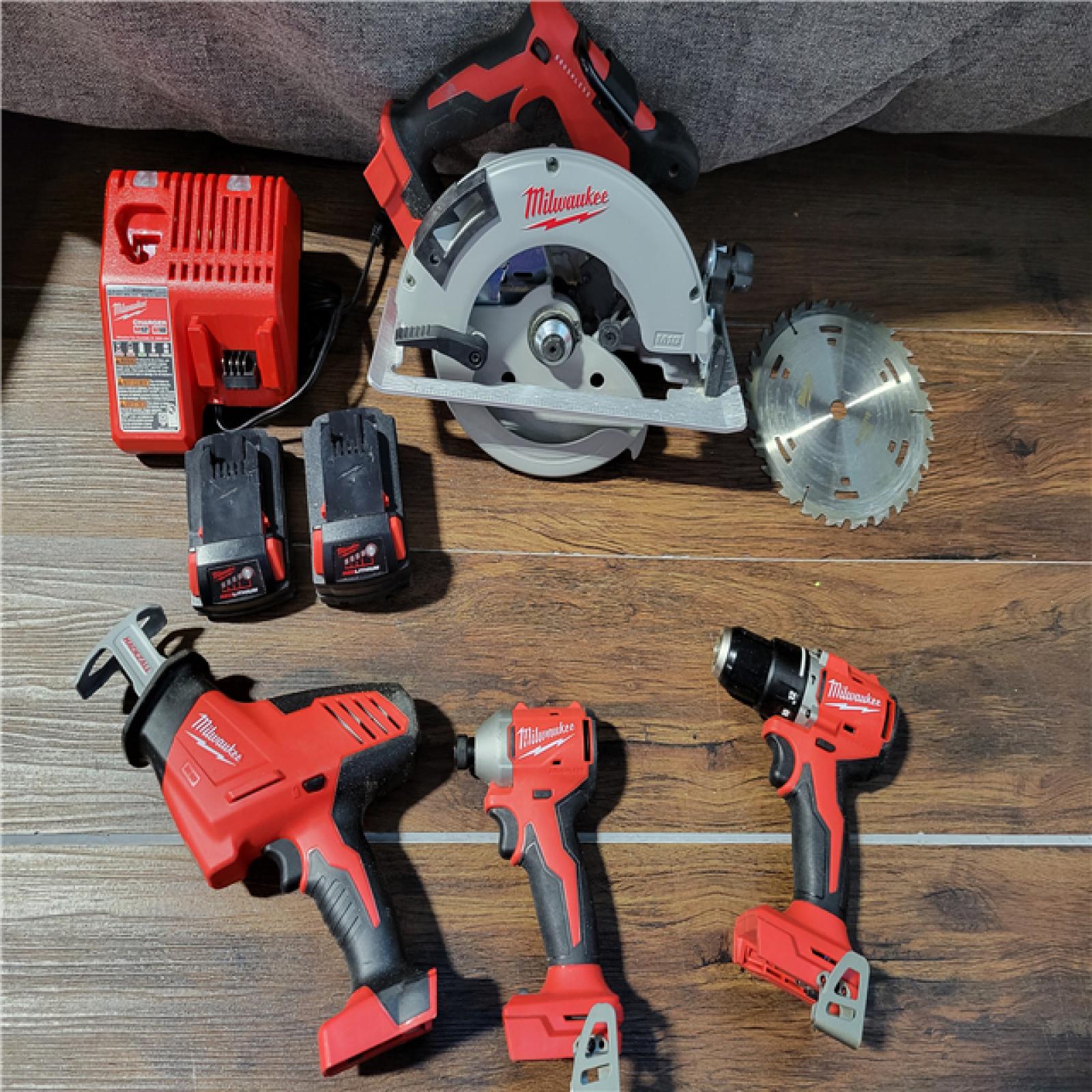 CALIFORNIA AS-IS MILWAUKEE M18 4-TOOL COMBO KIT(BATTERIES,CHARGER,AND BAG INCLUDED)