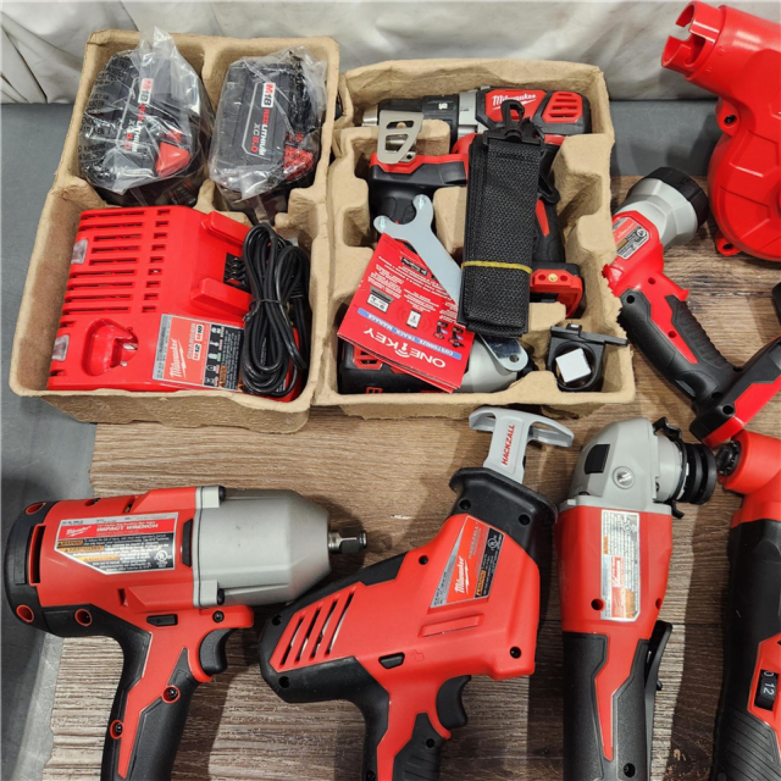 AS-IS M18 18-Volt Lithium-Ion Cordless Combo Kit (9-Tool) with (2) Batteries, Charger, and Tool Bag