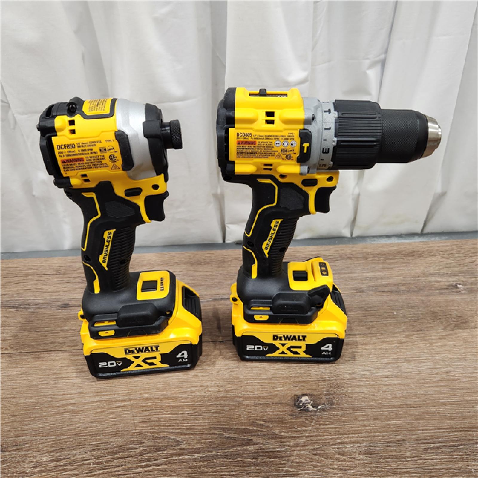 AS-IS DEWALT 20V MAX XR Hammer Drill and ATOMIC Impact Driver 2 Tool Cordless Combo Kit with (2) 4.0Ah Batteries, Charger, and Bag