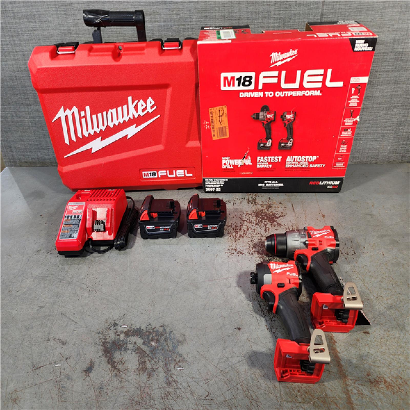 HOUSTON LOCATION - AS-IS (APPERAS LIKE NEW) M18 FUEL 18V Lithium-Ion Brushless Cordless Hammer Drill and Impact Driver Combo Kit (2-Tool) with 2 Batteries