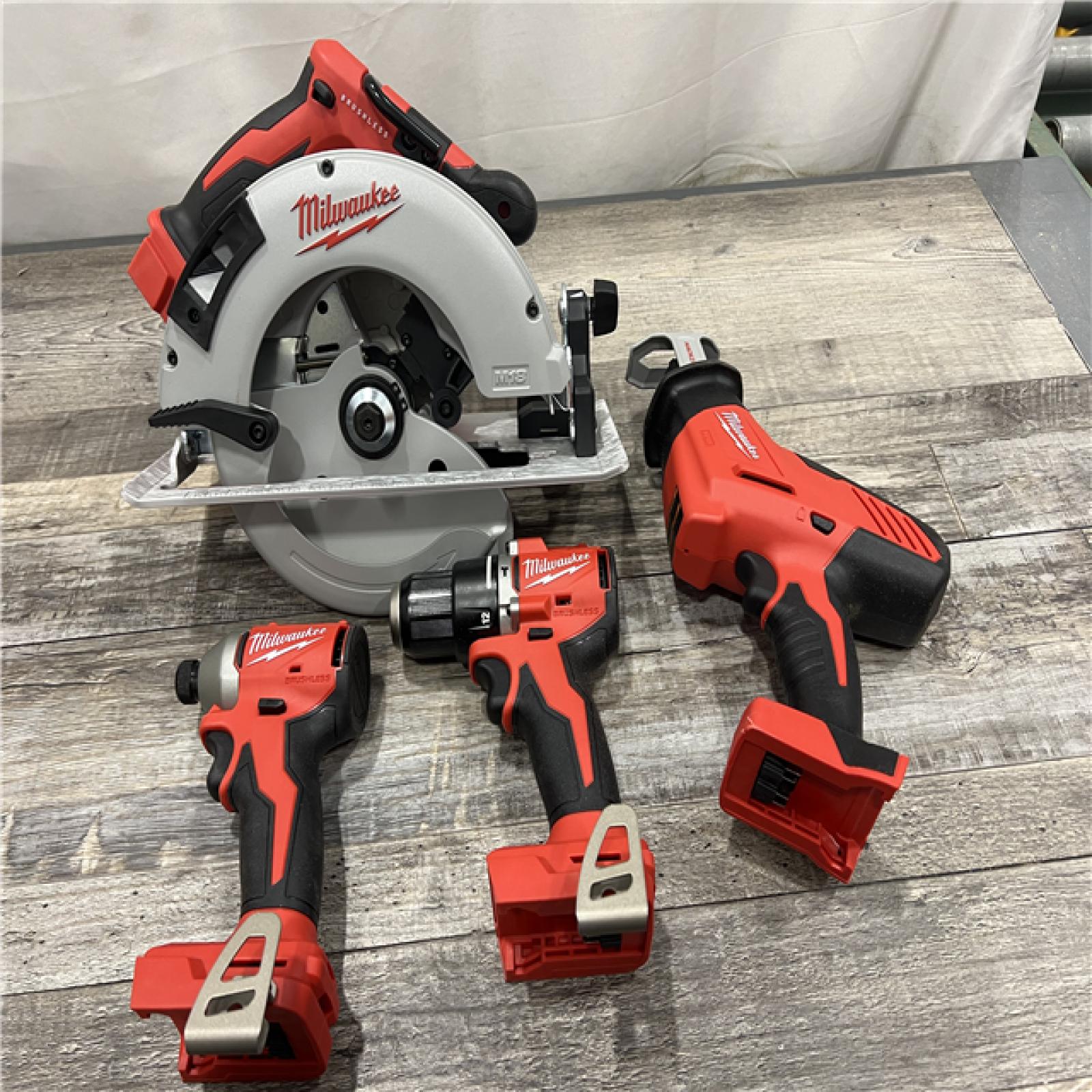 AS-IS Milwaukee M18 18-Volt Lithium-Ion Brushless Cordless Combo Kit (4-Tool) with 2-Batteries, 1-Charger and Tool Bag