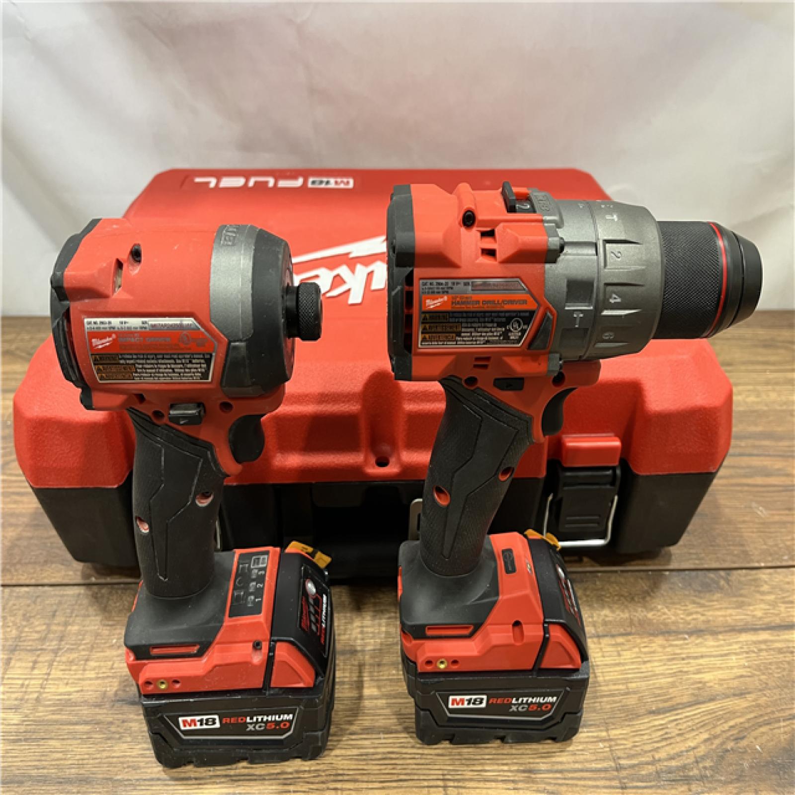 AS IS Milwaukee M18 FUEL 18V Lithium-Ion Brushless Cordless Hammer Drill and Impact Driver Combo Kit (2-Tool) with 2 Batteries