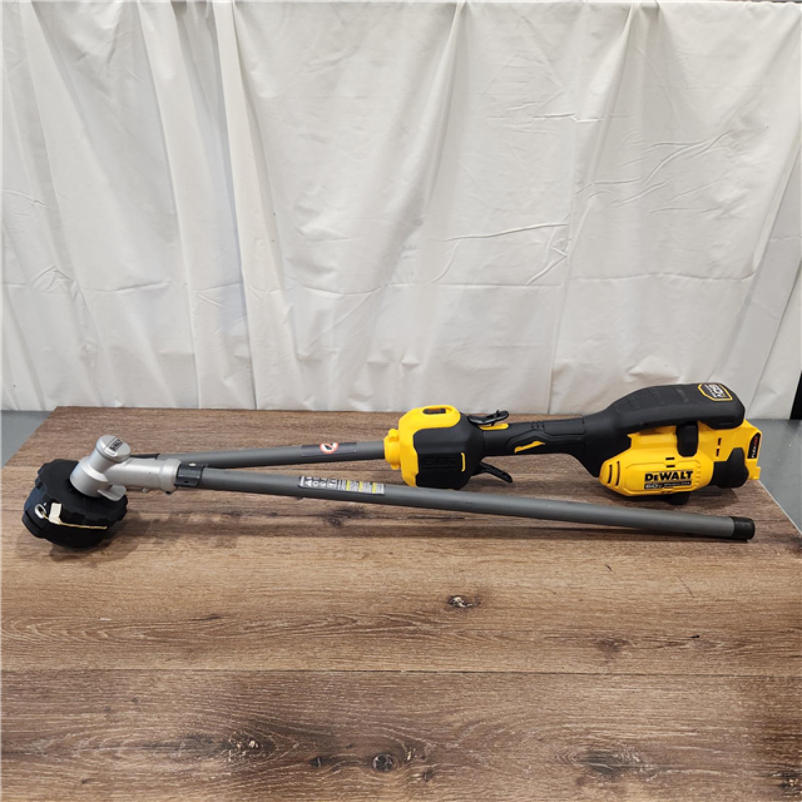 AS-IS FLEXVOLT 60V MAX 17 in. Cordless Battery Powered Attachment Capable Trimmer with Charger