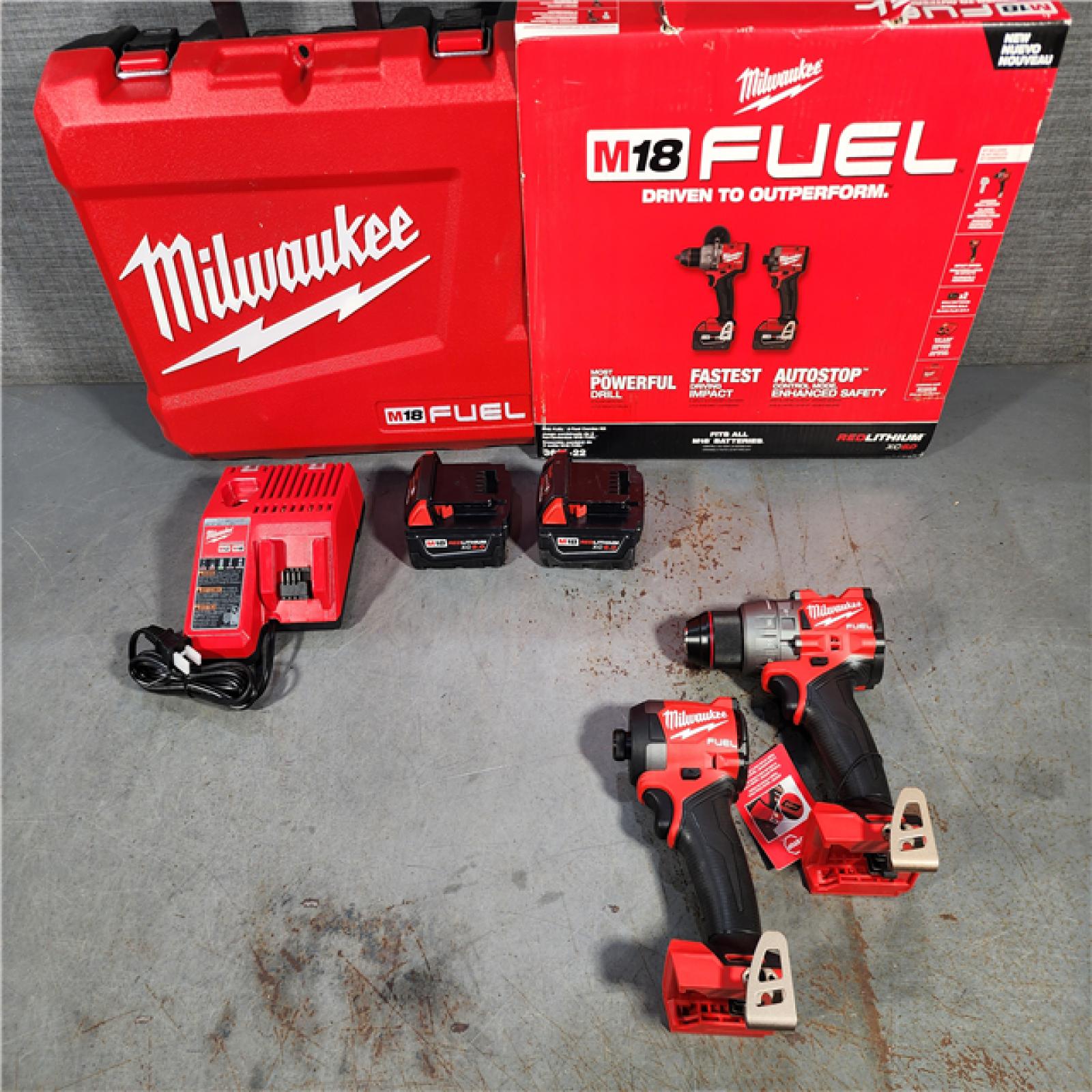 HOUSTON LOCATION - AS-IS (APPEARS LIKE NEW) Milwaukee M18 FUEL 18V Lithium-Ion Brushless Cordless Hammer Drill and Impact Driver Combo Kit (2-Tool) with 2 Batteries