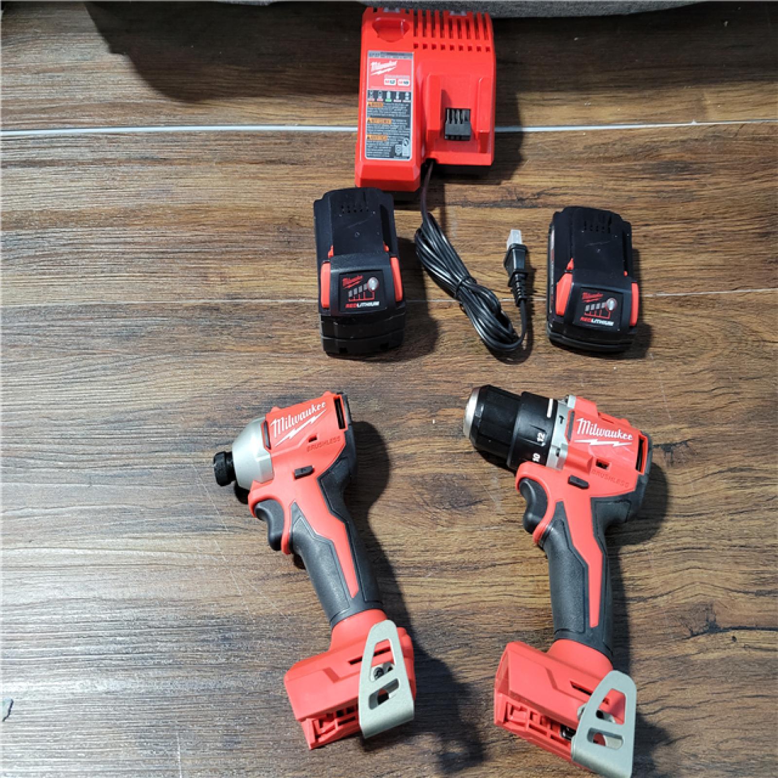 CALIFORNIA AS-IS MILWAUKEE M18 COMPACT BRUSHLESS 2-TOOL COMBO KIT(BATTERIES,CHARGER,AND BAG INCLUDED)