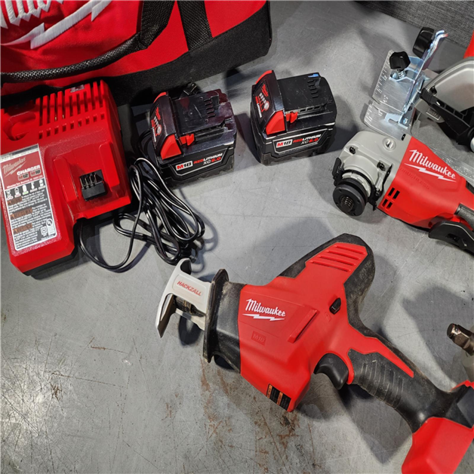 HOUSTON LOCATION - AS-IS M18 18-Volt Lithium-Ion Cordless Combo Kit (7-Tool) with (2) Batteries, Charger, and Tool Bag