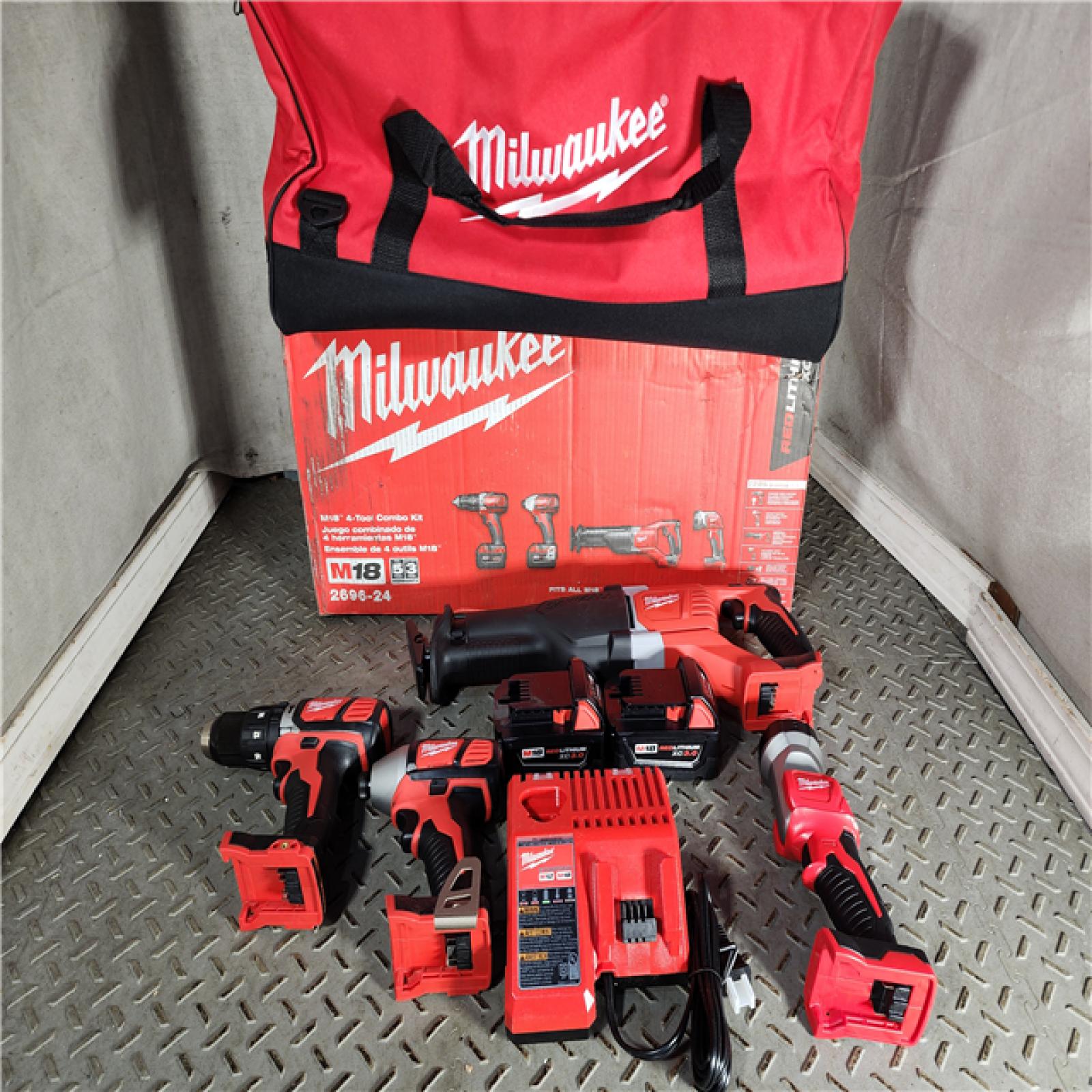 HOUSTON LOCATION - AS-IS (APPEARS LIKE NEW) M18 18V Lithium-Ion Cordless Combo Tool Kit with Two 3.0Ah Batteries, 1-Charger, 1-Tool Bag (4-Tool)