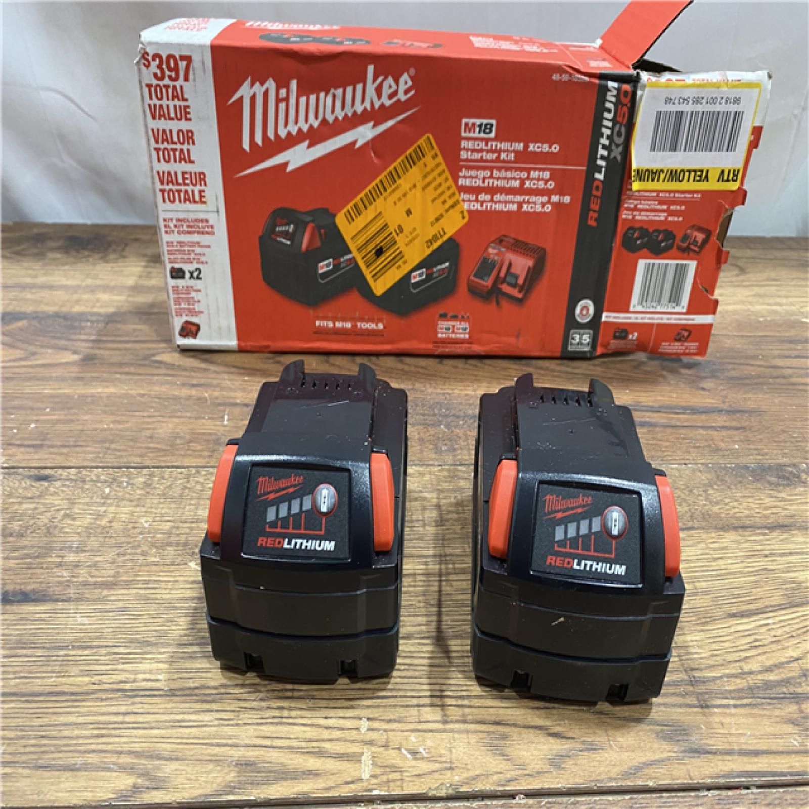 AS IS M18 18-Volt Lithium-Ion XC Starter Kit with Two 5.0Ah Batteries and Charger