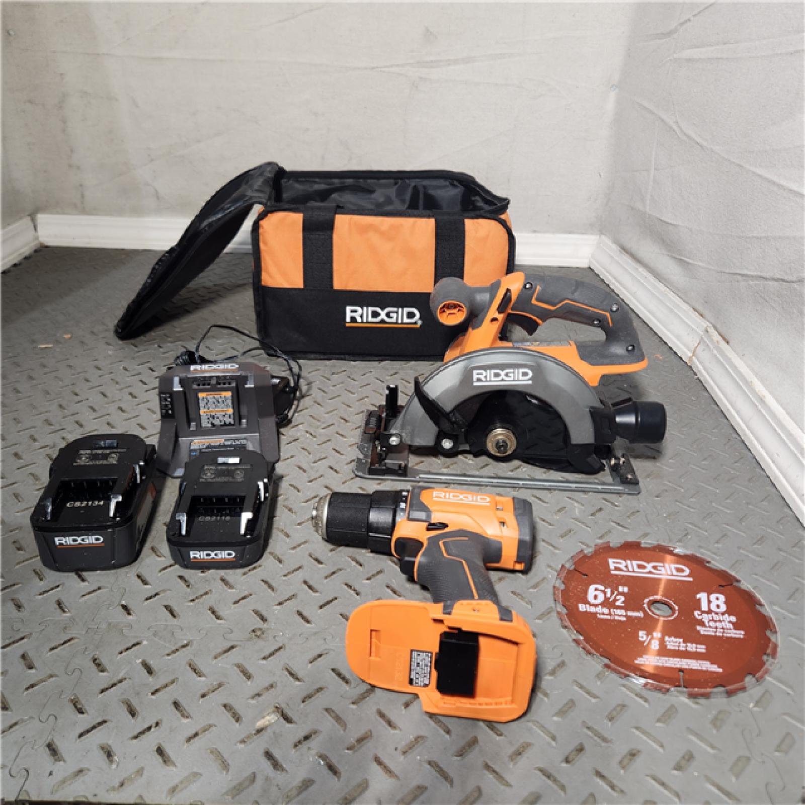 HOUSTON Location-AS-IS-RIDGID 18V Cordless 1/2 in. Drill/Driver and 6-1/2 in. Circular Saw Combo Kit with 2.0 Ah and 4.0 Ah Battery, Charger, and Bag APPEARS IN NEW Condition