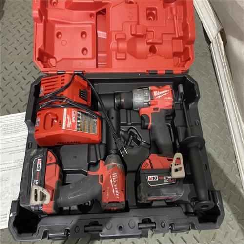 Houston location AS-IS Milwaukee M18â„¢ FUELâ„¢ 2-Tool Hammer Drill/Impact Driver Combo Kit - by International Tool