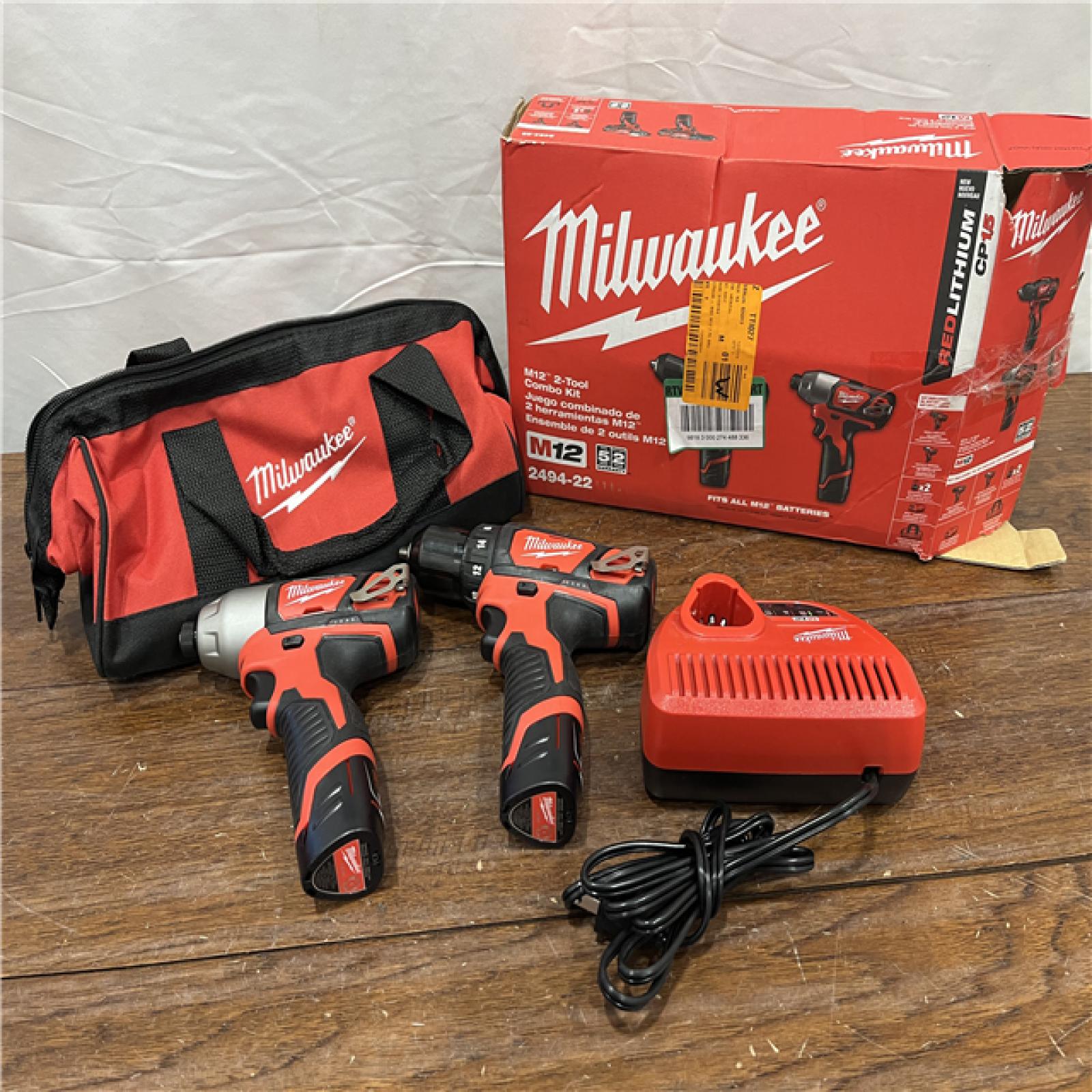 AS]-IS M12 12V Lithium-Ion Cordless Drill Driver/Impact Driver Combo Kit with Two 1.5Ah Batteries, Charger and Bag (2-Tool)