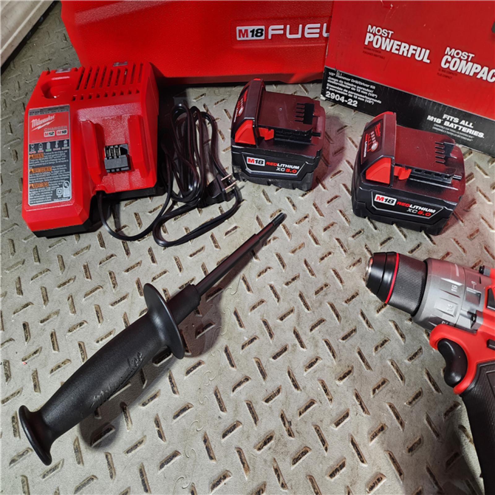 HOUSTON LOCATION - AS-IS (APPEARS LIKE NEW) Milwaukee 2904-22 Hammer Drill Driver Kit with Batteries  Charger & Tool Case  Red