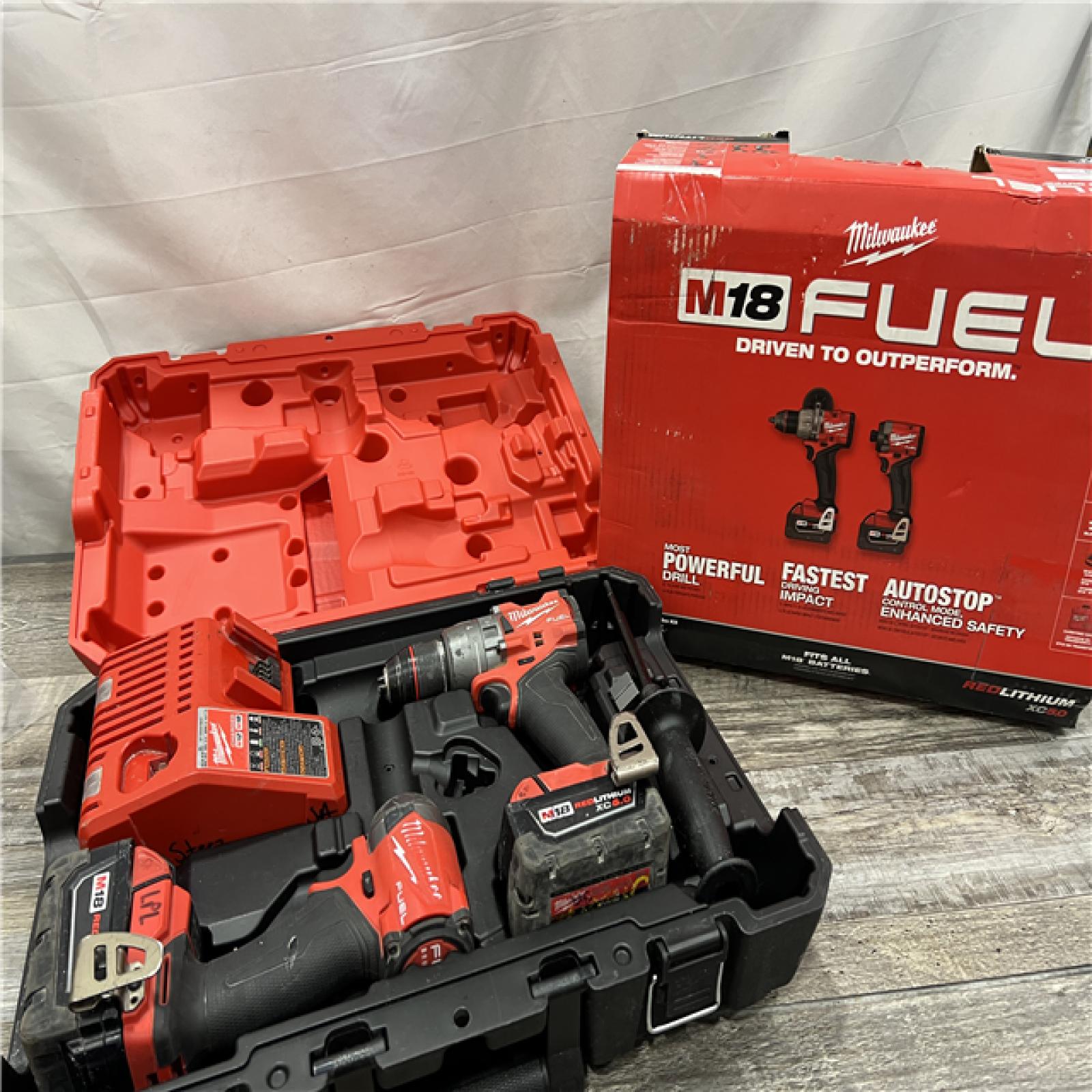 AS-IS Milwaukee M18 FUEL 18V Lithium-Ion Brushless Cordless Hammer Drill and Impact Driver Combo Kit (2-Tool) with 2 Batteries