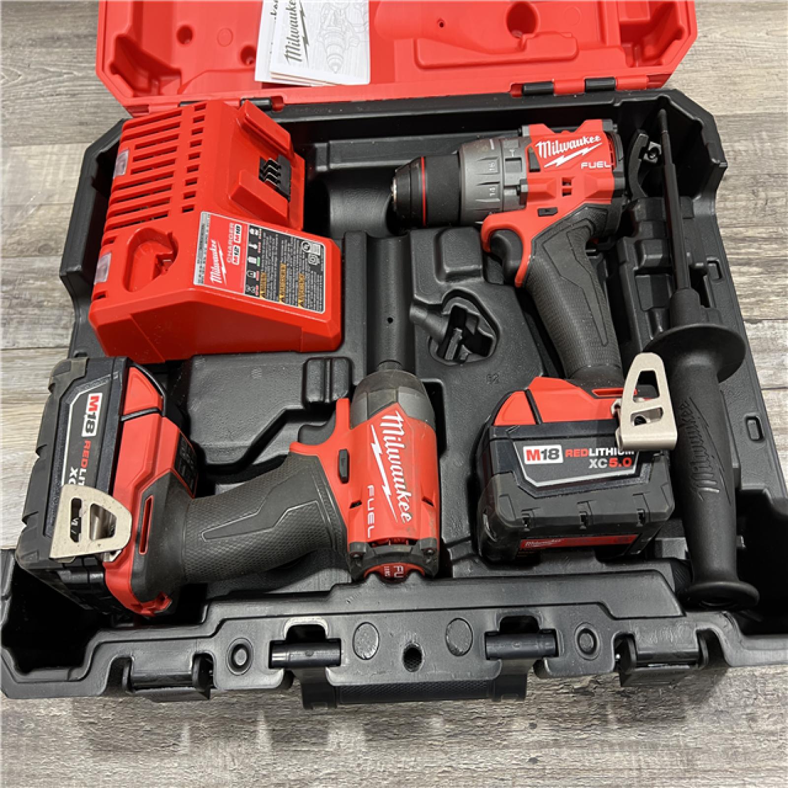 AS-IS Milwaukee M18 FUEL 18V Lithium-Ion Brushless Cordless Hammer Drill and Impact Driver Combo Kit (2-Tool) with 2 Batteries