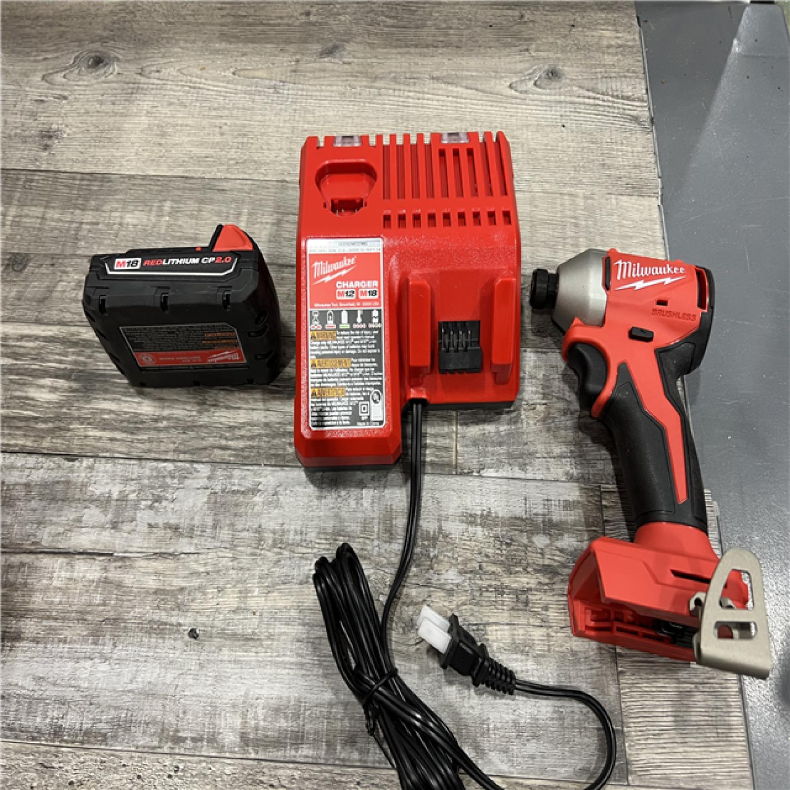 AS-IS Milwaukee M18 Compact Brushless 1/4  Hex Impact Driver Kit