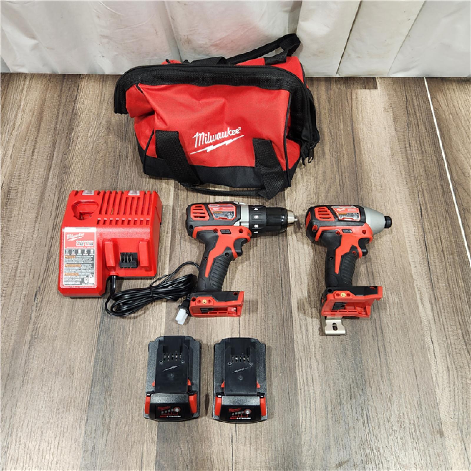 AS IS Milwaukee M18 18V Cordless Brushed 2 Tool Drill/Driver and Impact Driver Kit