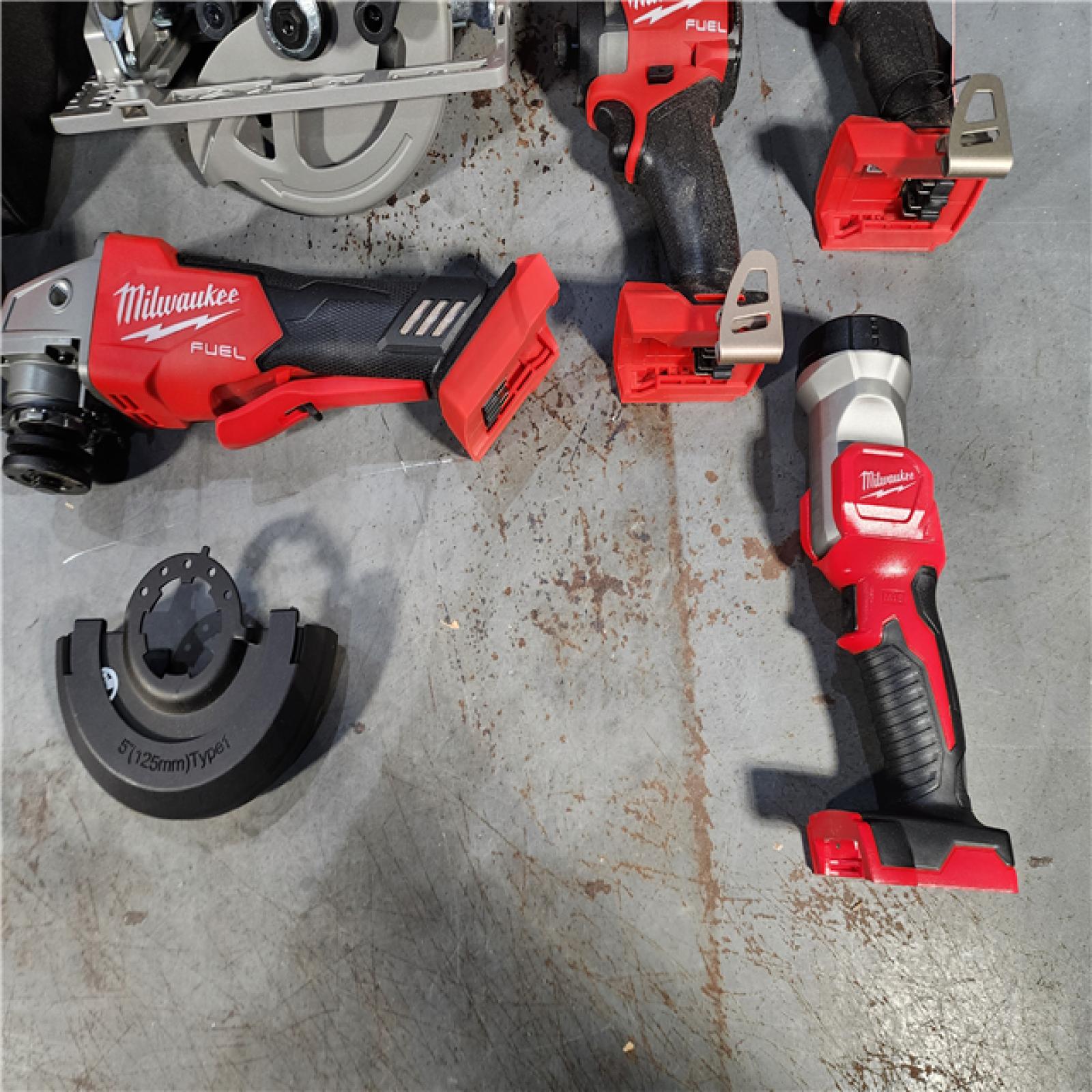 HOUSTON LOCATION - AS-IS (APPEARS LIKE NEW) M18 18-Volt Lithium-Ion Brushless Cordless FUEL Combo Kit (5-Tool) with 2-Batteries, 1-Charger, and Tool Bag