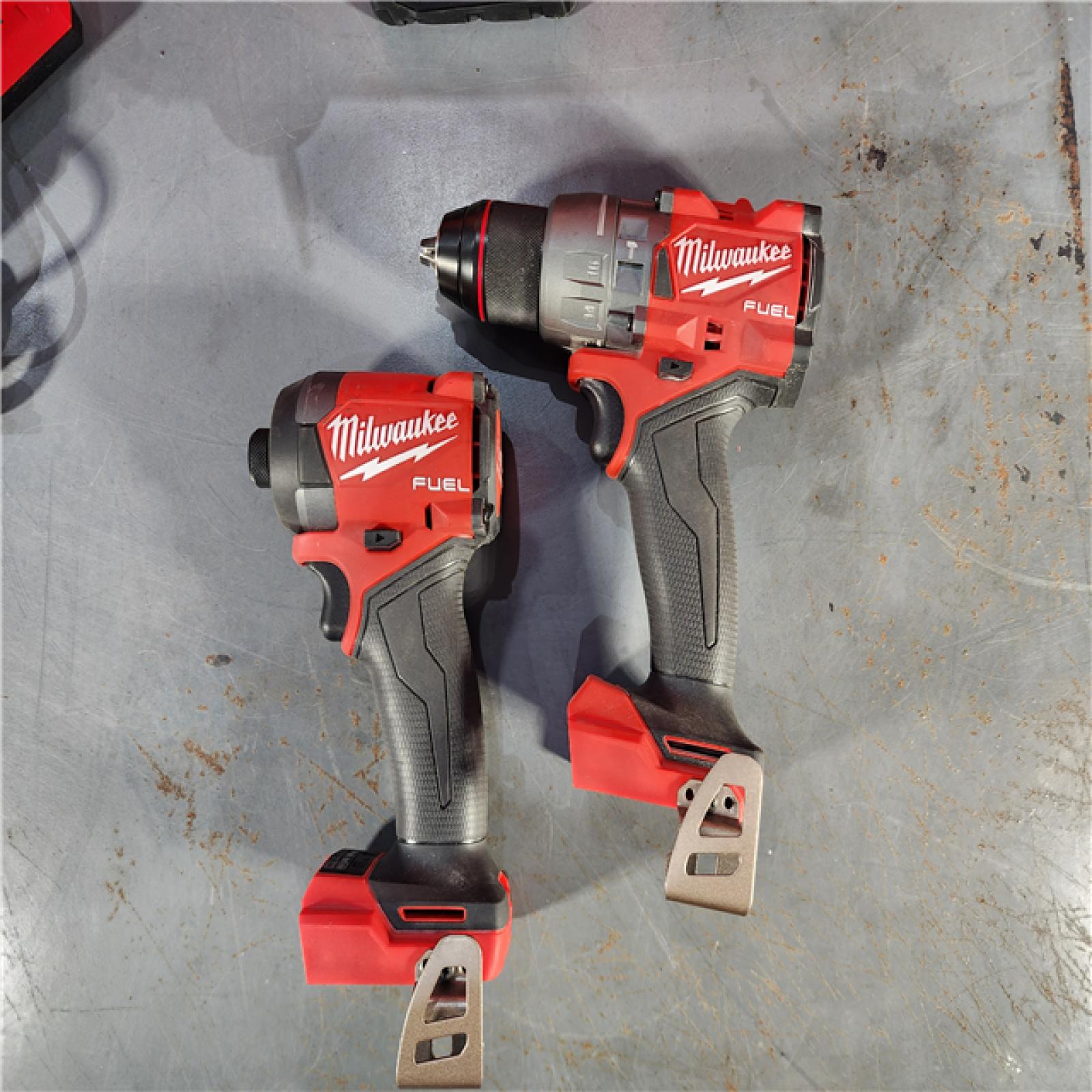 HOUSTON LOCATION - AS-IS Milwaukee M18 FUEL 18V Lithium-Ion Brushless Cordless Hammer Drill and Impact Driver Combo Kit (2-Tool) with 2 Batteries