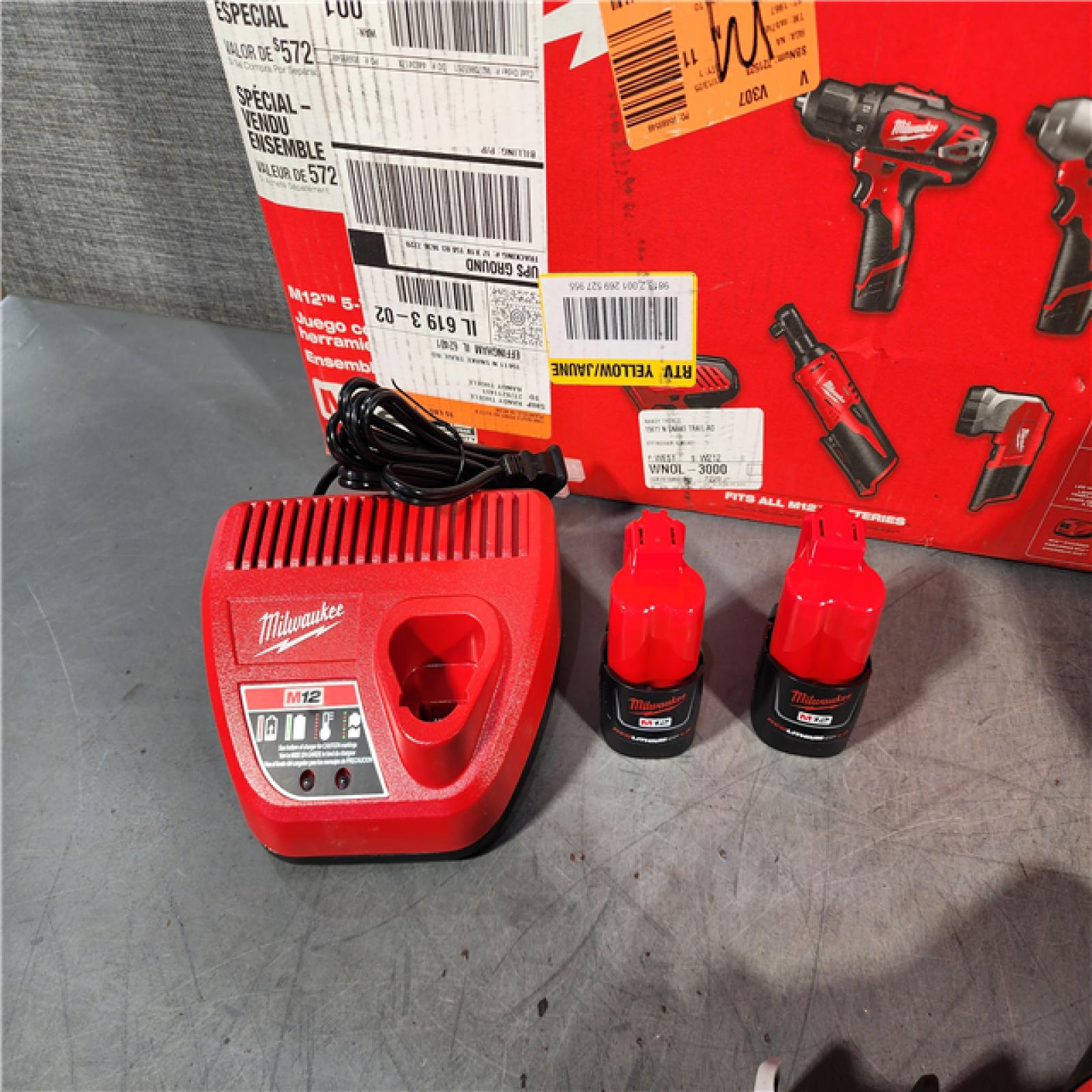 HOUSTON LOCATION - AS-IS (APPEARS LIKE NEW) MILWAUKEE M12 12V Lithium-Ion Cordless Combo Kit (5-Tool) with Two 1.5Ah Batteries, Charger & Tool Bag