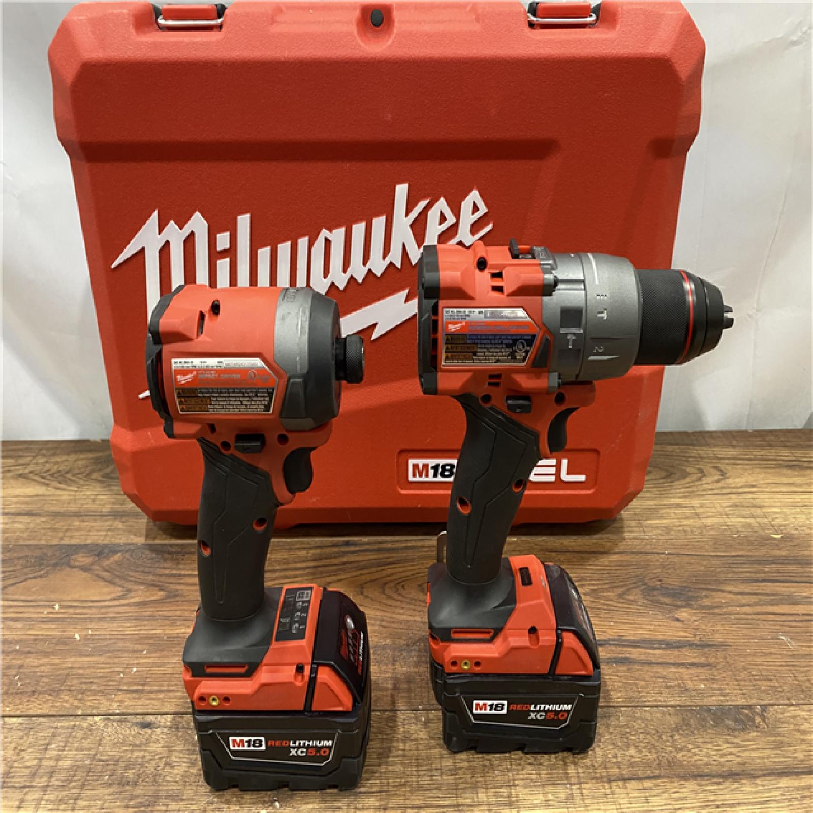 AS IS Milwaukee M18 FUEL 18V Lithium-Ion Brushless Cordless Hammer Drill and Impact Driver Combo Kit (2-Tool) with 2 Batteries