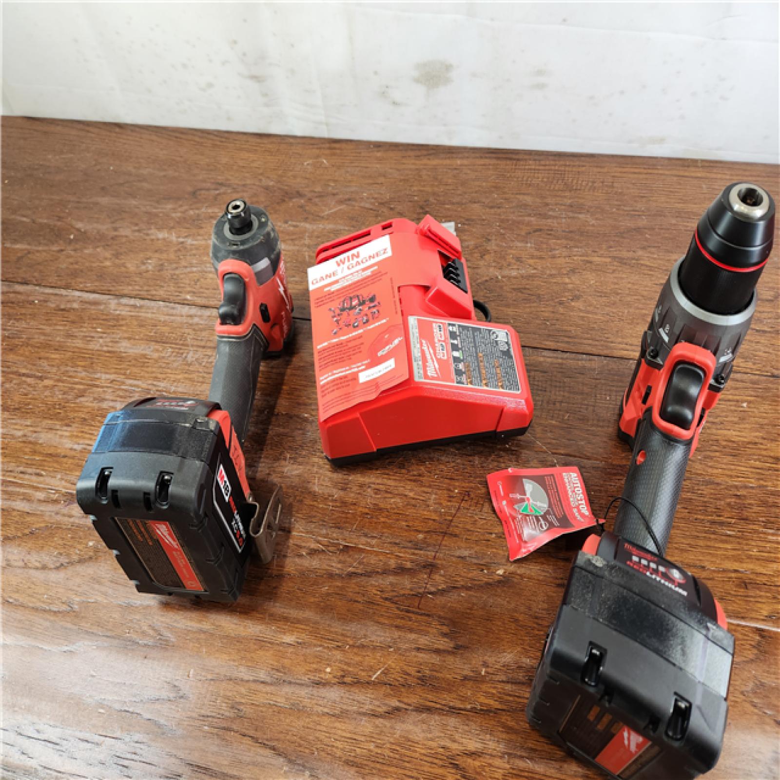 AS-IS Milwaukee 3697-22 M18 FUEL 1/2 Hammer Driller/Driver &1/4 Hex Impact Driver 2 Tool Combo Kit