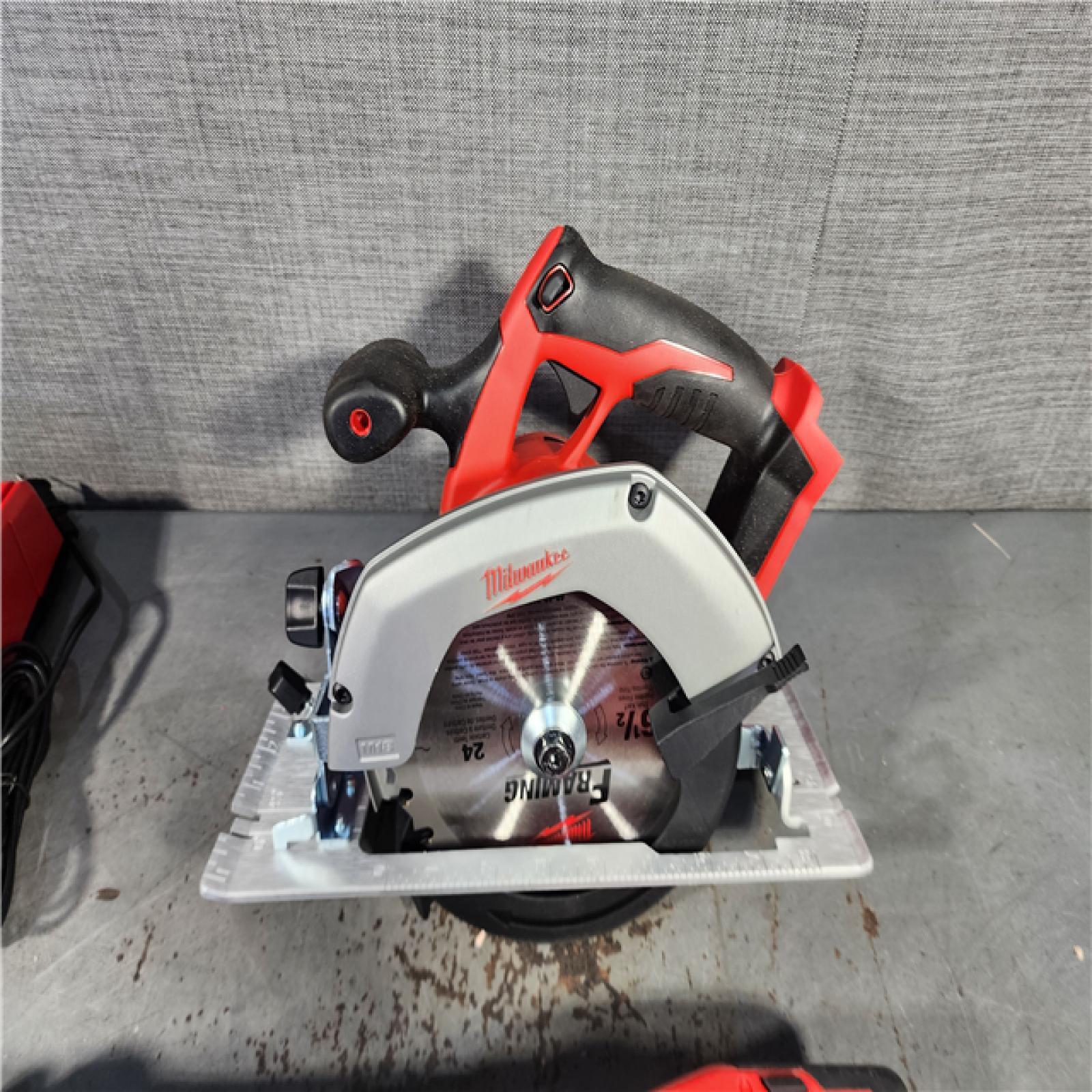 HOUSTON LOCATION - AS-IS MILWAUKEE 4 TOOL COMBO KIT W/ (2) BATTERY & CHARGER