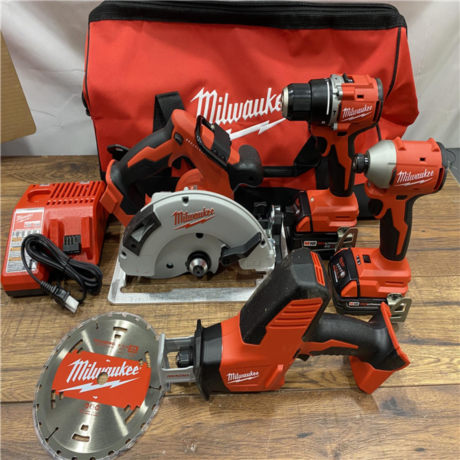 AS IS Milwaukee M18 18-Volt Lithium-Ion Brushless Cordless Combo Kit (4-Tool) with 2-Batteries, 1-Charger and Tool Bag