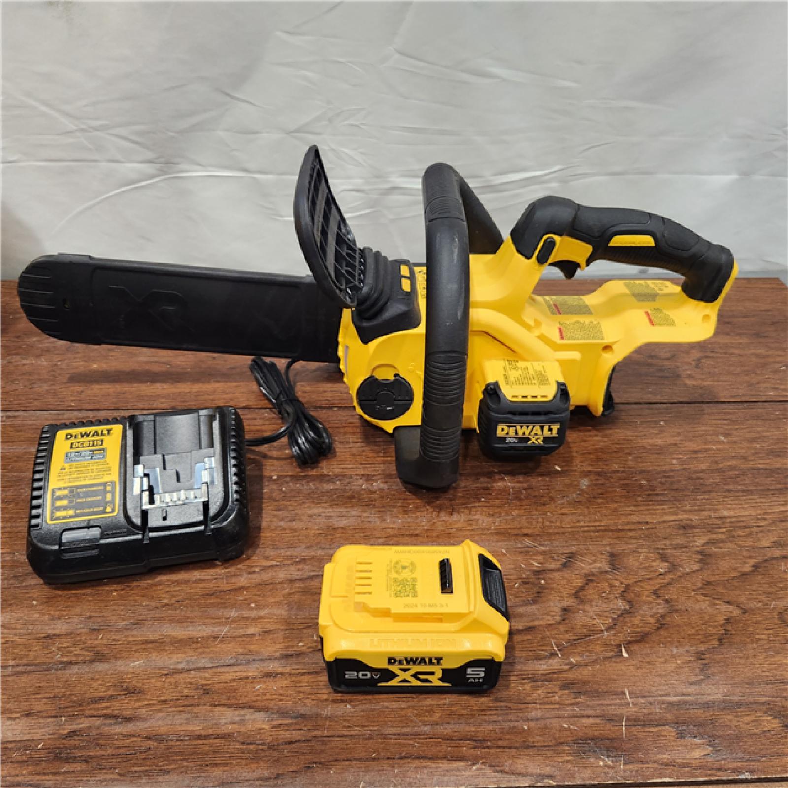 AS-IS Dewalt 7605686 12 in. 20V Battery Powered Chainsaw