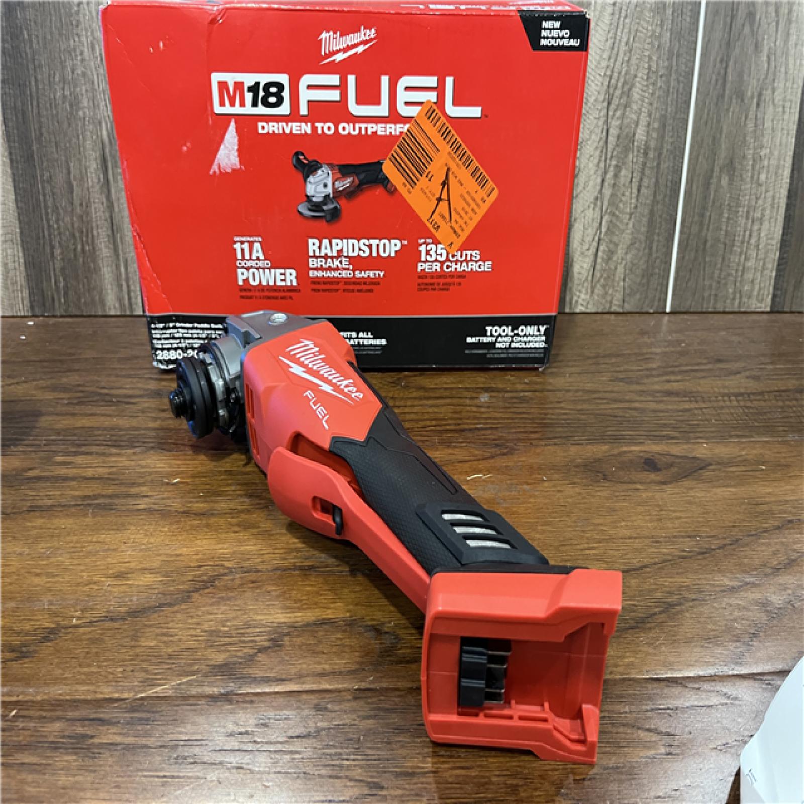 AS-IS Milwaukee  M18 FUEL 18-Volt Lithium-Ion Brushless Cordless 4-1/2 in./5 in. Grinder W/Paddle Switch (Tool-Only)