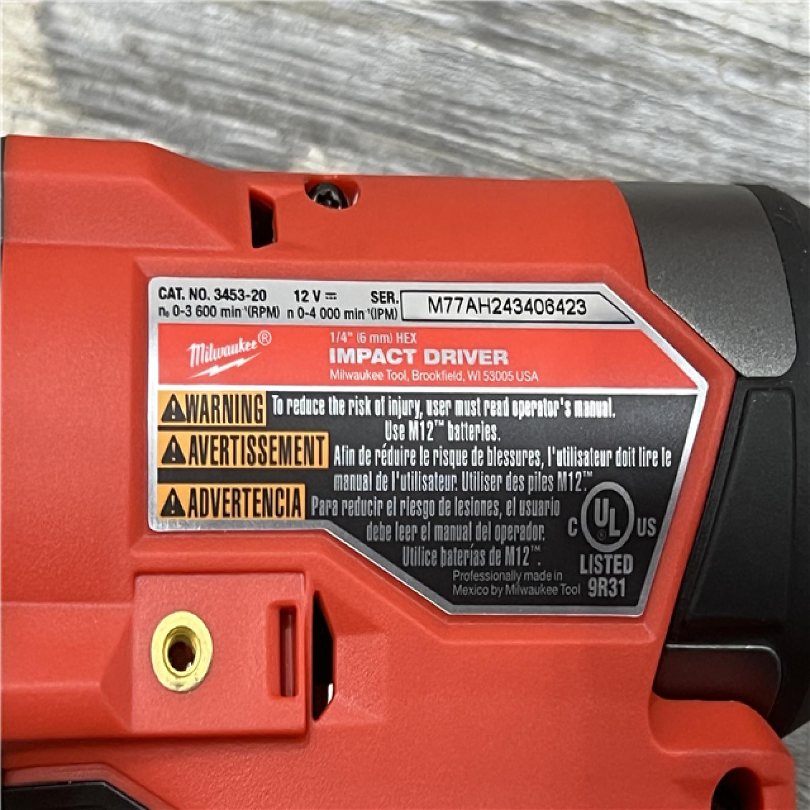 AS-IS Milwaukee M12 FUEL Brushless Cordless 1/4inch Hex Impact Driver with 3/8inch Ratchet Kit