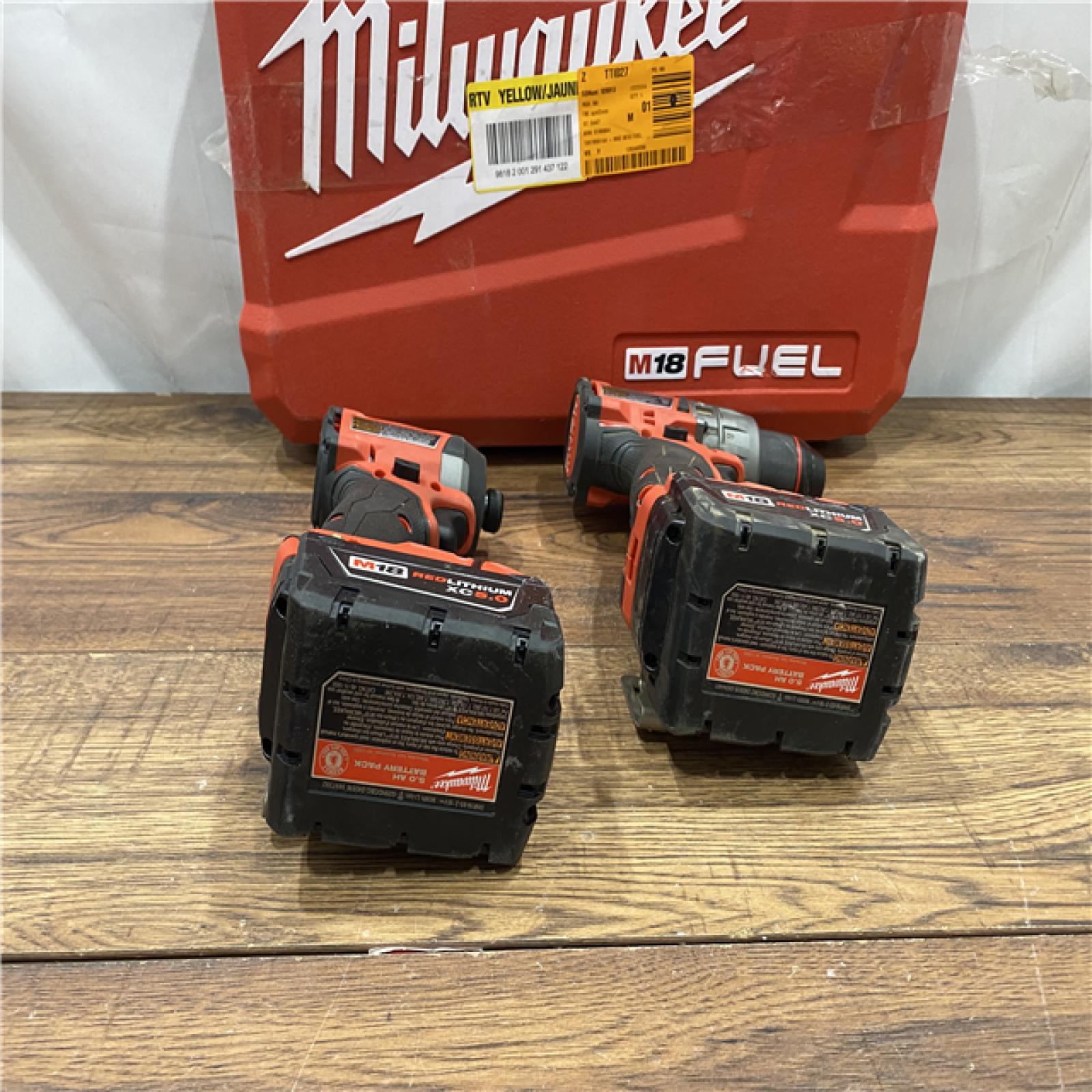 AS IS Milwaukee M18 FUEL 18V Lithium-Ion Brushless Cordless Hammer Drill and Impact Driver Combo Kit (2-Tool) with 2 Batteries