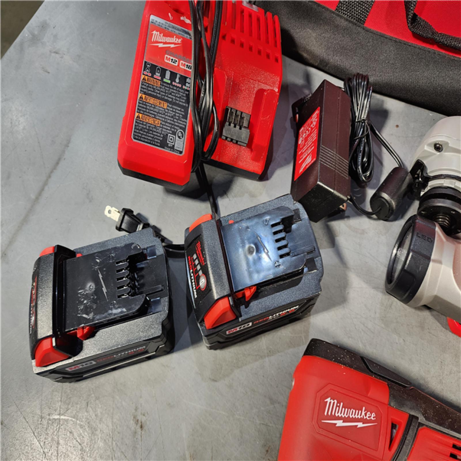 HOUSTON LOCATION - AS-IS MILWAUKEE 9 TOOL COMBO KIT W/ (2) BATTERY & CHARGER