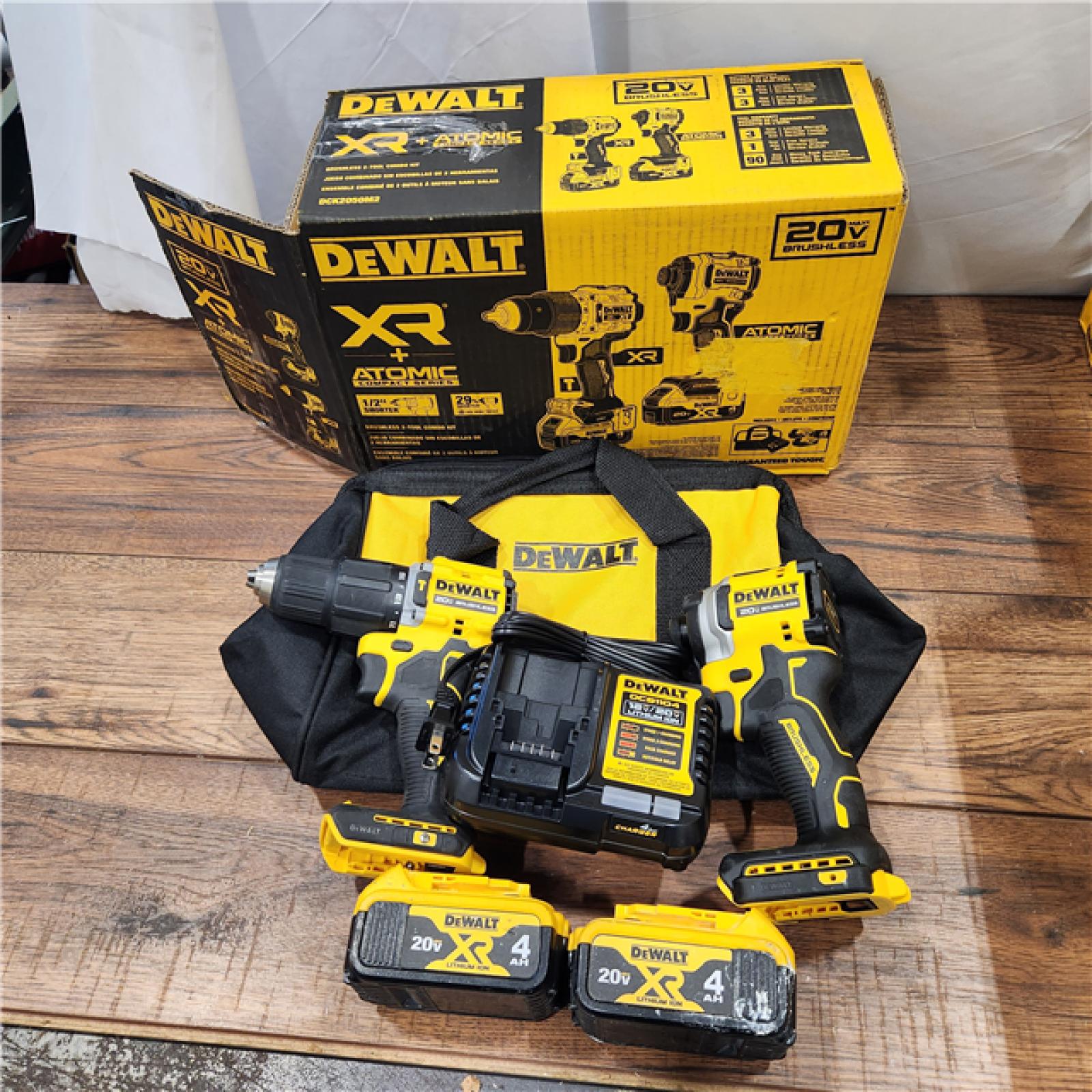 AS-IS 20V MAX XR Hammer Drill and ATOMIC Impact Driver 2 Tool Cordless Combo Kit with (2) 4.0Ah Batteries, Charger, and Bag