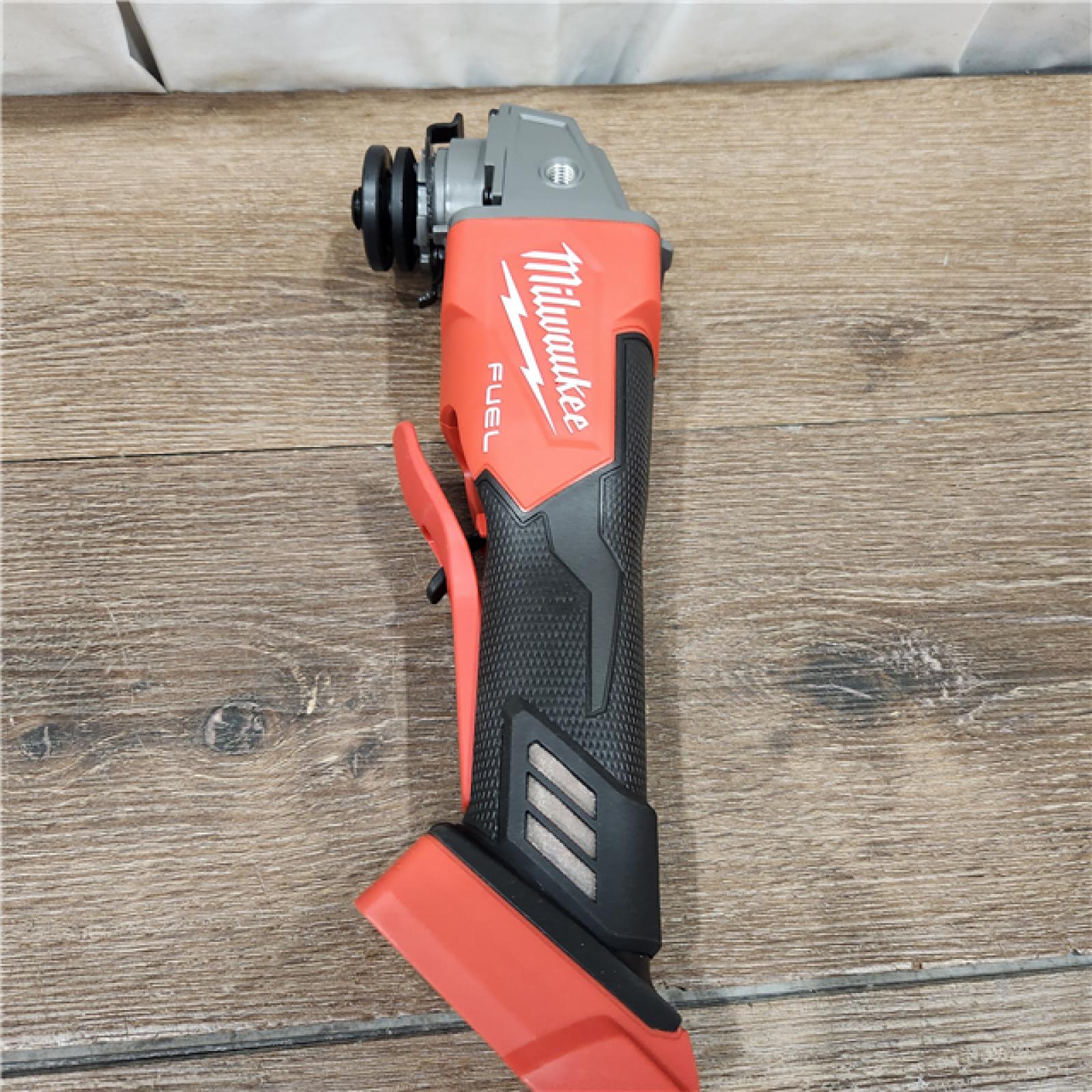 AS-IS Milwaukee 2880-20 M18 FUEL 18-Volt Lithium-Ion Brushless Cordless 4-1/2 in./5 in. Grinder W/Paddle Switch (Tool-Only)