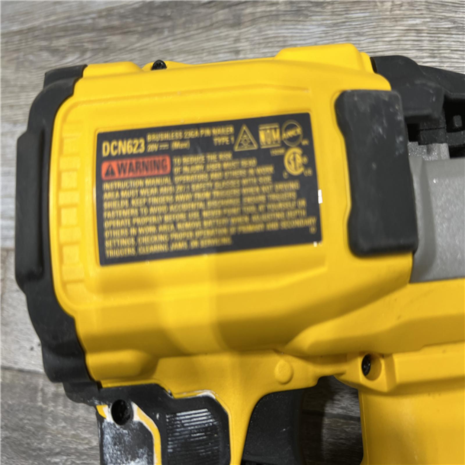 AS-IS DEWALT ATOMIC 20V MAX Lithium Ion Cordless 23 Gauge Pin Nailer Kit with 2.0Ah Battery and Charger