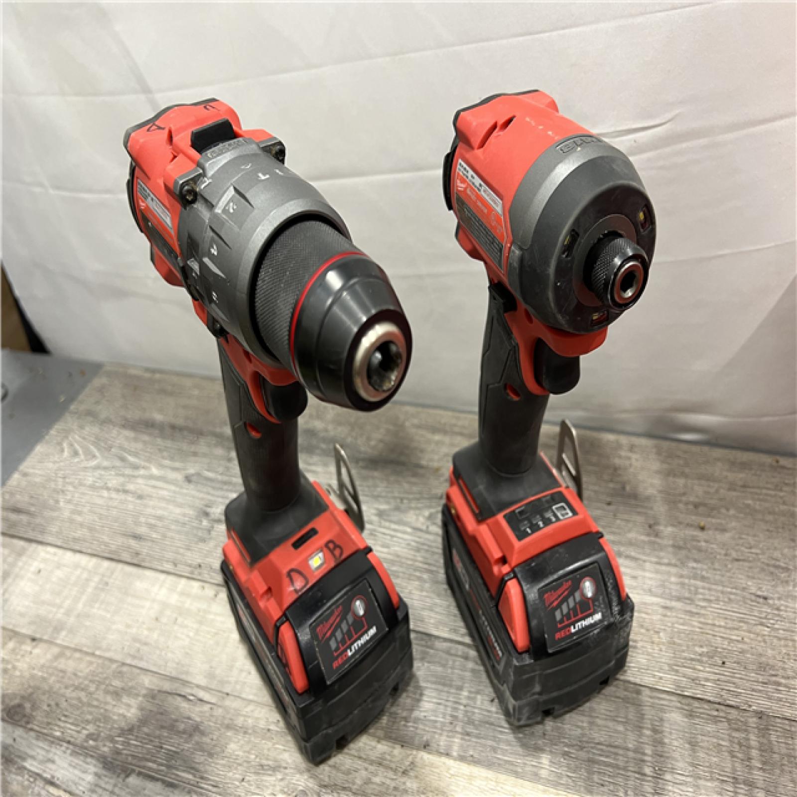 AS-IS MILWAUKEE M18 FUEL 18V Lithium-Ion Brushless Cordless Hammer Drill and Impact Driver Combo Kit (2-Tool) with 2 Batteries