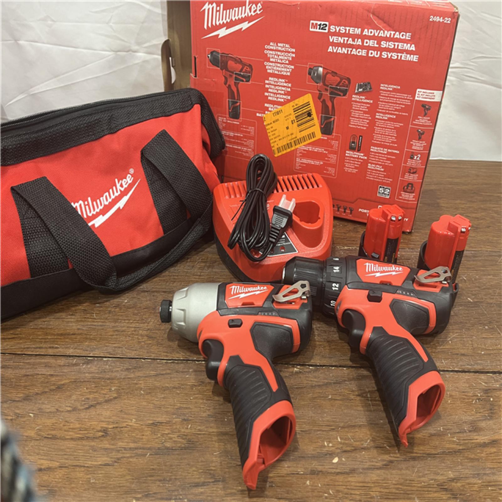 AS-ISMilwaukee 2494-22 M12 Cordless Combination 3/8  Drill / Driver and 1/4  Hex Impact Driver Dual Power Tool Kit (2 Lithium Ion Batteries  Charger  and B