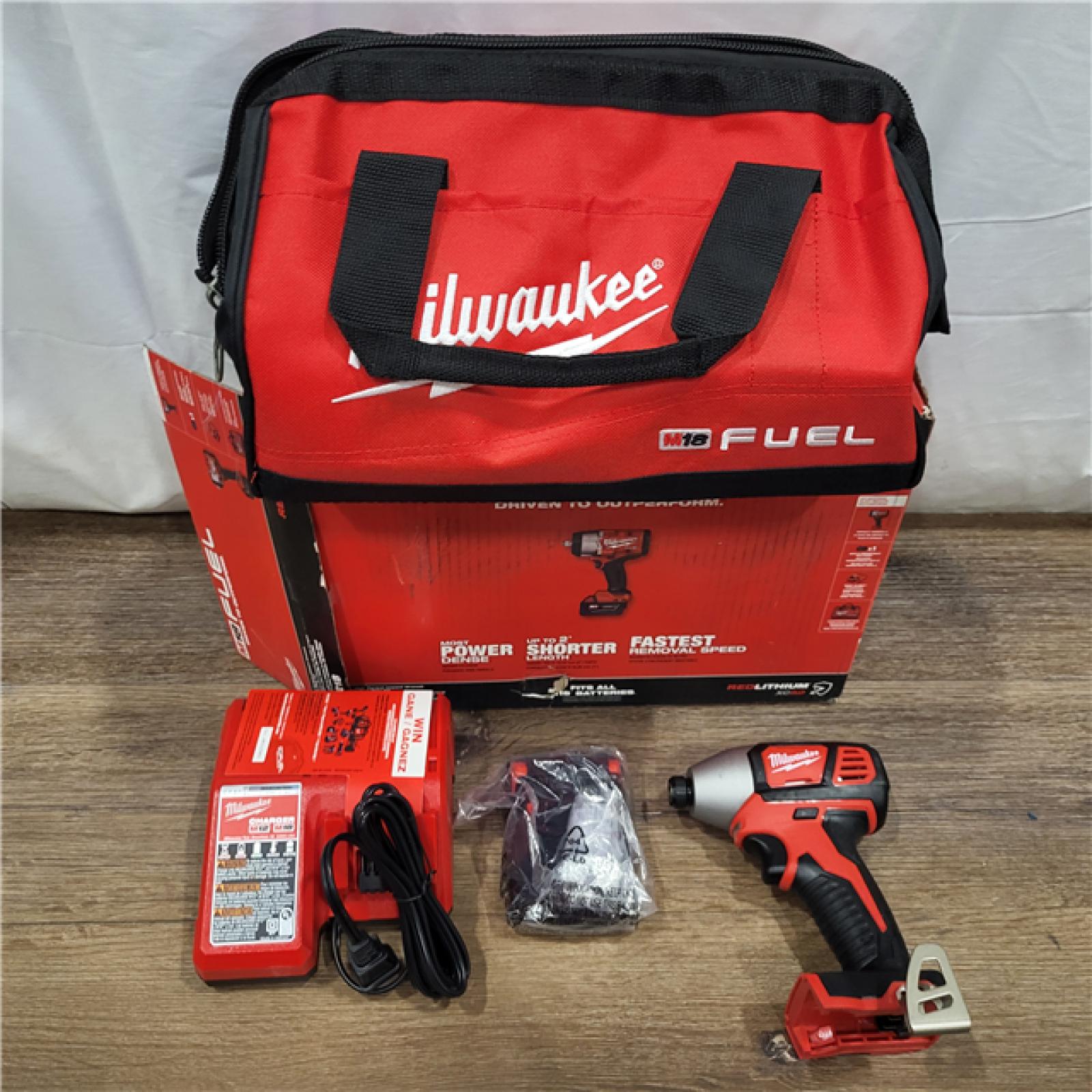 AS-ISMilwaukee M18 1/2 in. Cordless Brushless High Torque Impact Wrench Kit (Battery & Charger)