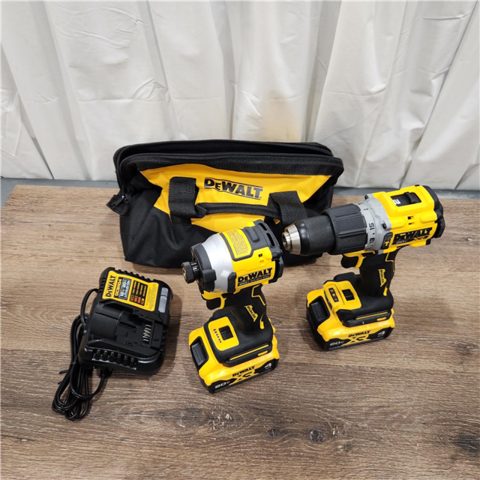 AS-IS DEWALT 20V MAX XR Hammer Drill and ATOMIC Impact Driver 2 Tool Cordless Combo Kit with (2) 4.0Ah Batteries, Charger, and Bag