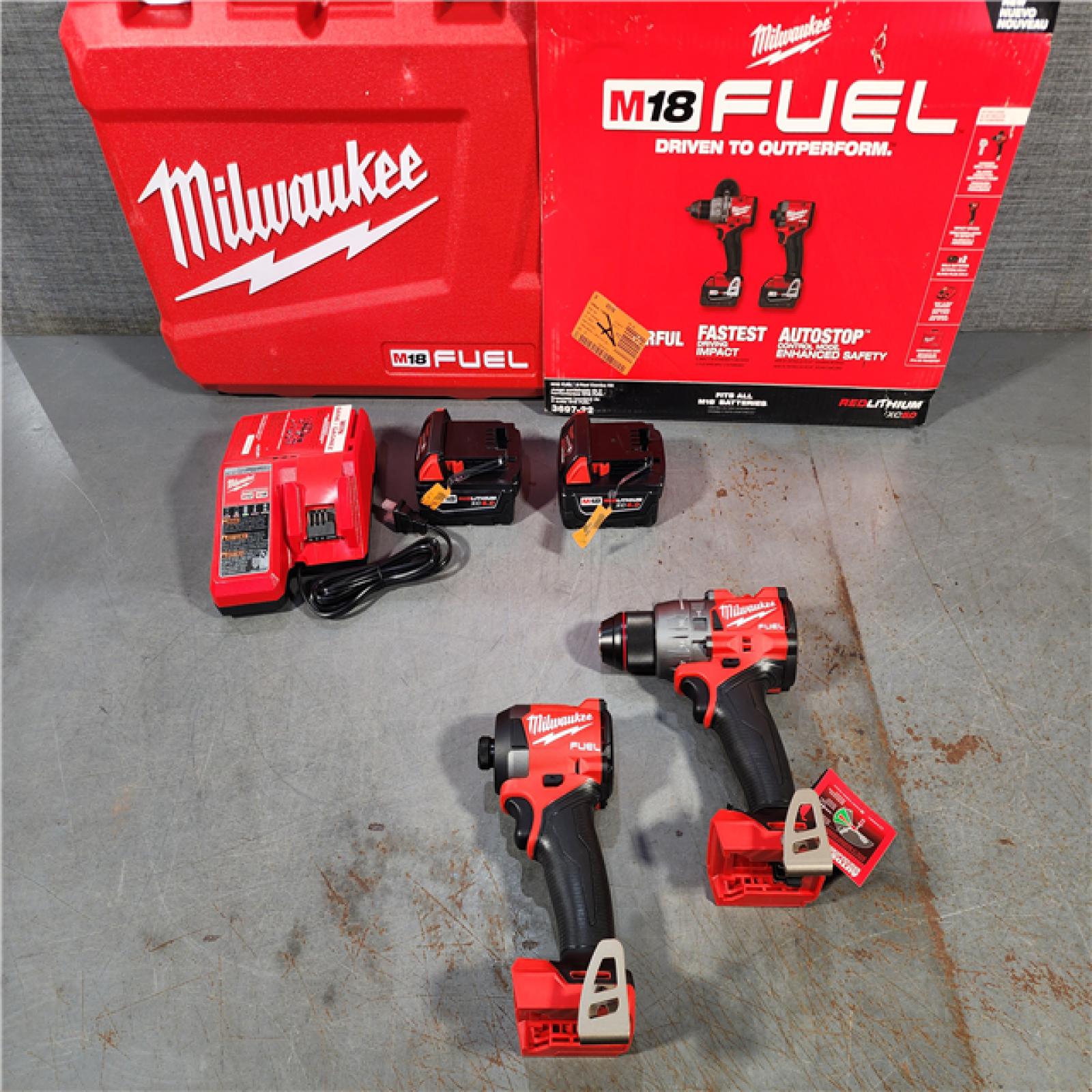 HOUSTON LOCATION - AS-IS (APPEARS LIKE NEW) Milwaukee M18 FUEL 18V Lithium-Ion Brushless Cordless Hammer Drill and Impact Driver Combo Kit (2-Tool) with 2 Batteries