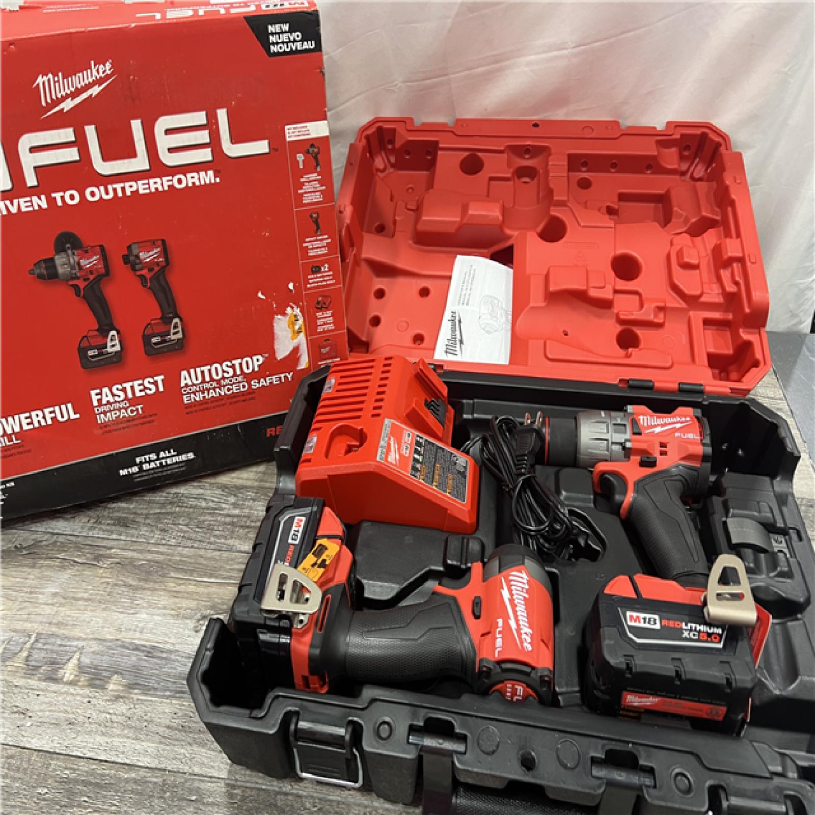 AS-IS MILWAUKEE M18 FUEL 18V Lithium-Ion Brushless Cordless Hammer Drill and Impact Driver Combo Kit (2-Tool) with 2 Batteries