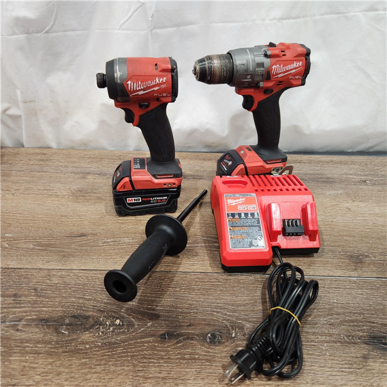 AS-IS Milwaukee M18 FUEL 18V Lithium-Ion Brushless Cordless Hammer Drill and Impact Driver Combo Kit (2-Tool) with 2 Batteries